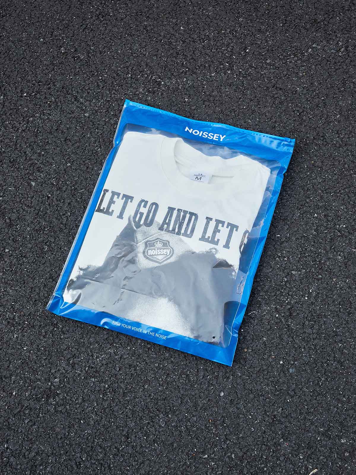 "Let Go and Let God." NOISSEY Boxy Oversized Graphic Tee – Vintage White