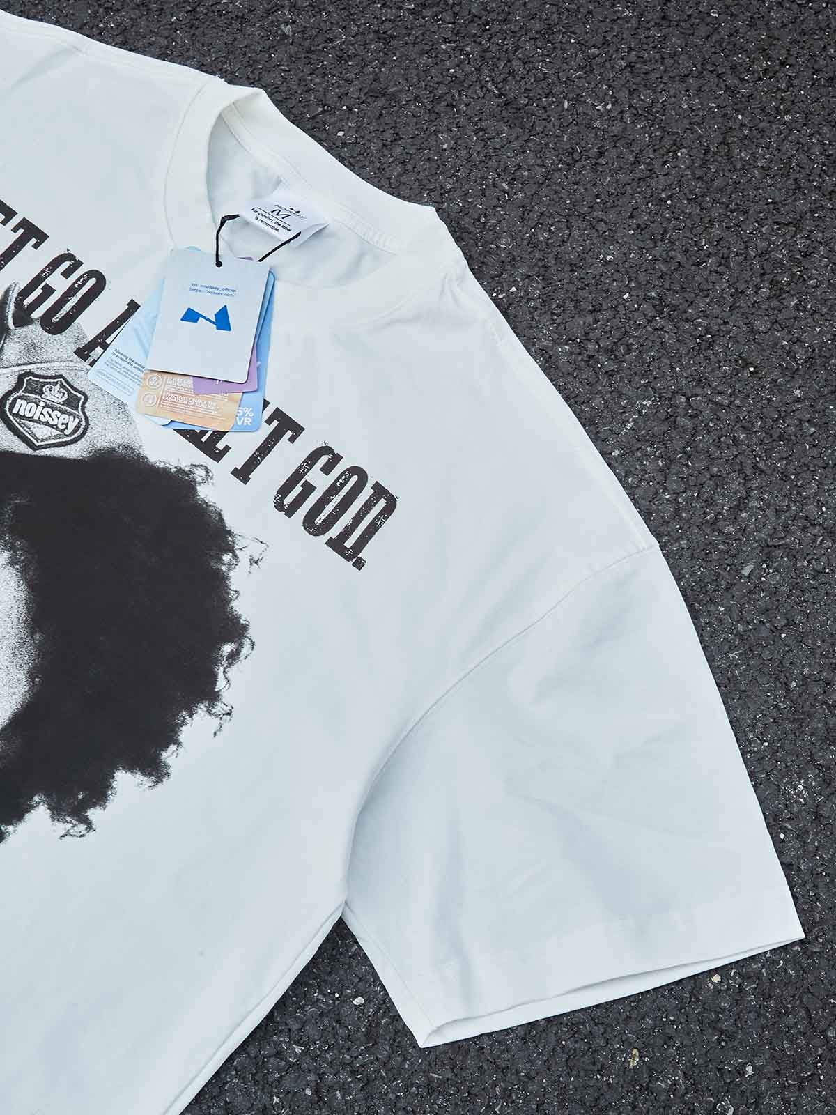 "Let Go and Let God." NOISSEY Boxy Oversized Graphic Tee – Vintage White