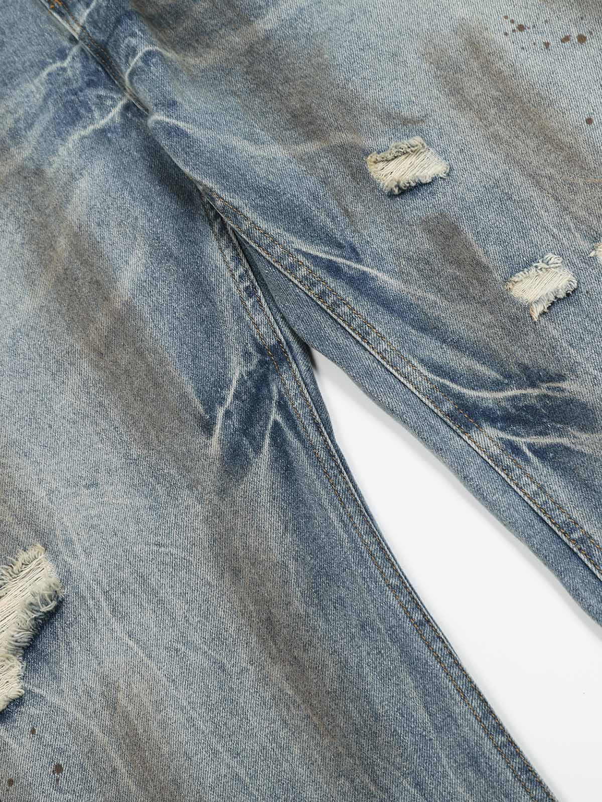 Distressed Ripped Machete-Cut Jeans