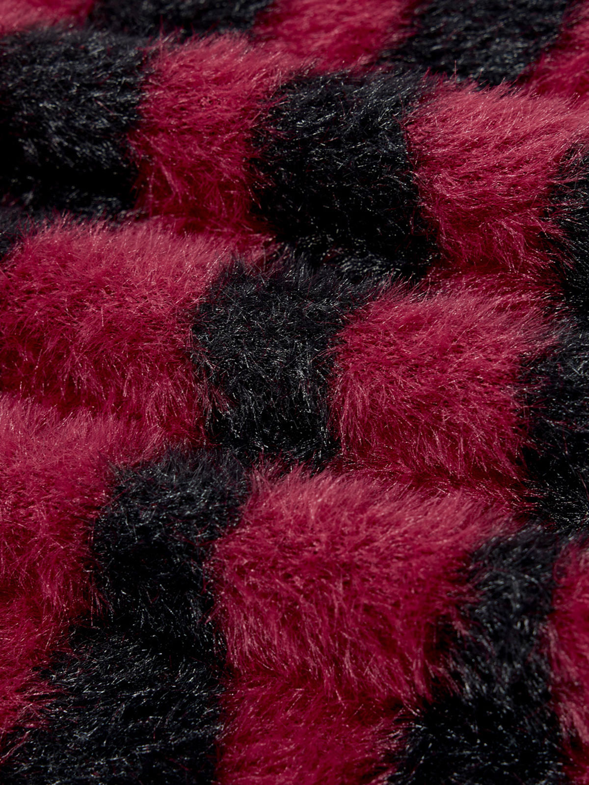 Zebra-striped cross plush sweater