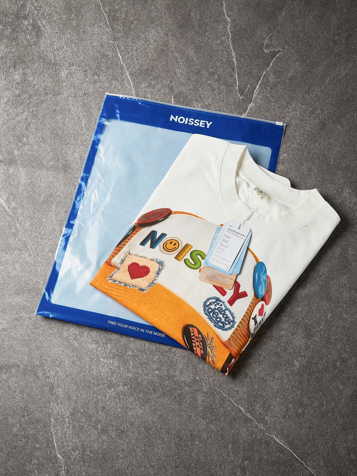 NOISSEY "Patchwork Bad Boy" Shimmering Jewelry Badge Cap Cartoon Portrait Oversized Tee