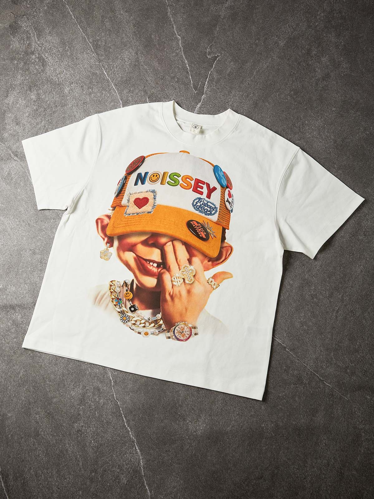 NOISSEY "Patchwork Bad Boy" Shimmering Jewelry Badge Cap Cartoon Portrait Oversized Tee