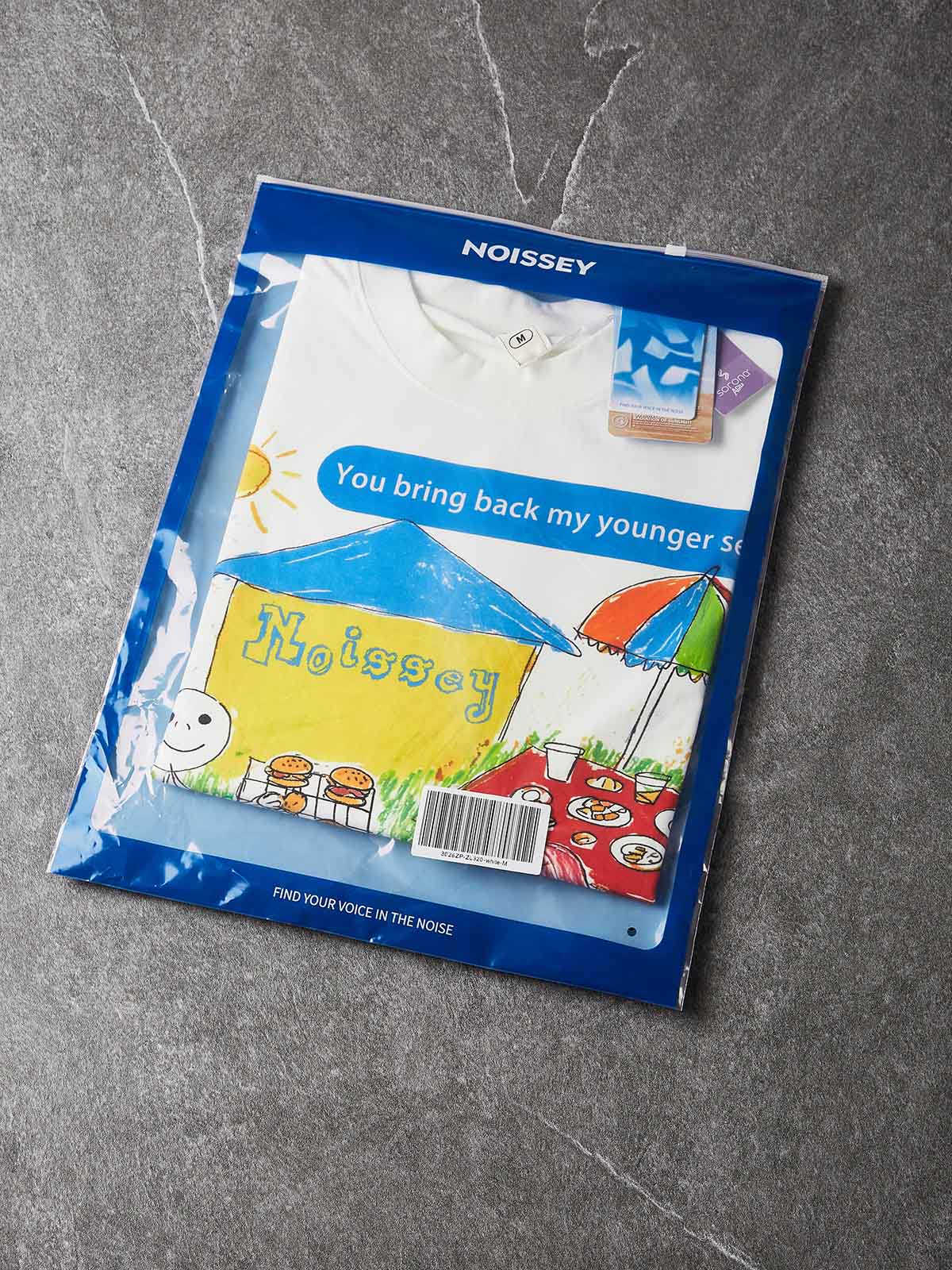 NOISSEY "Younger Self" Crayon Picnic Graphic Oversized Tee - Studio White