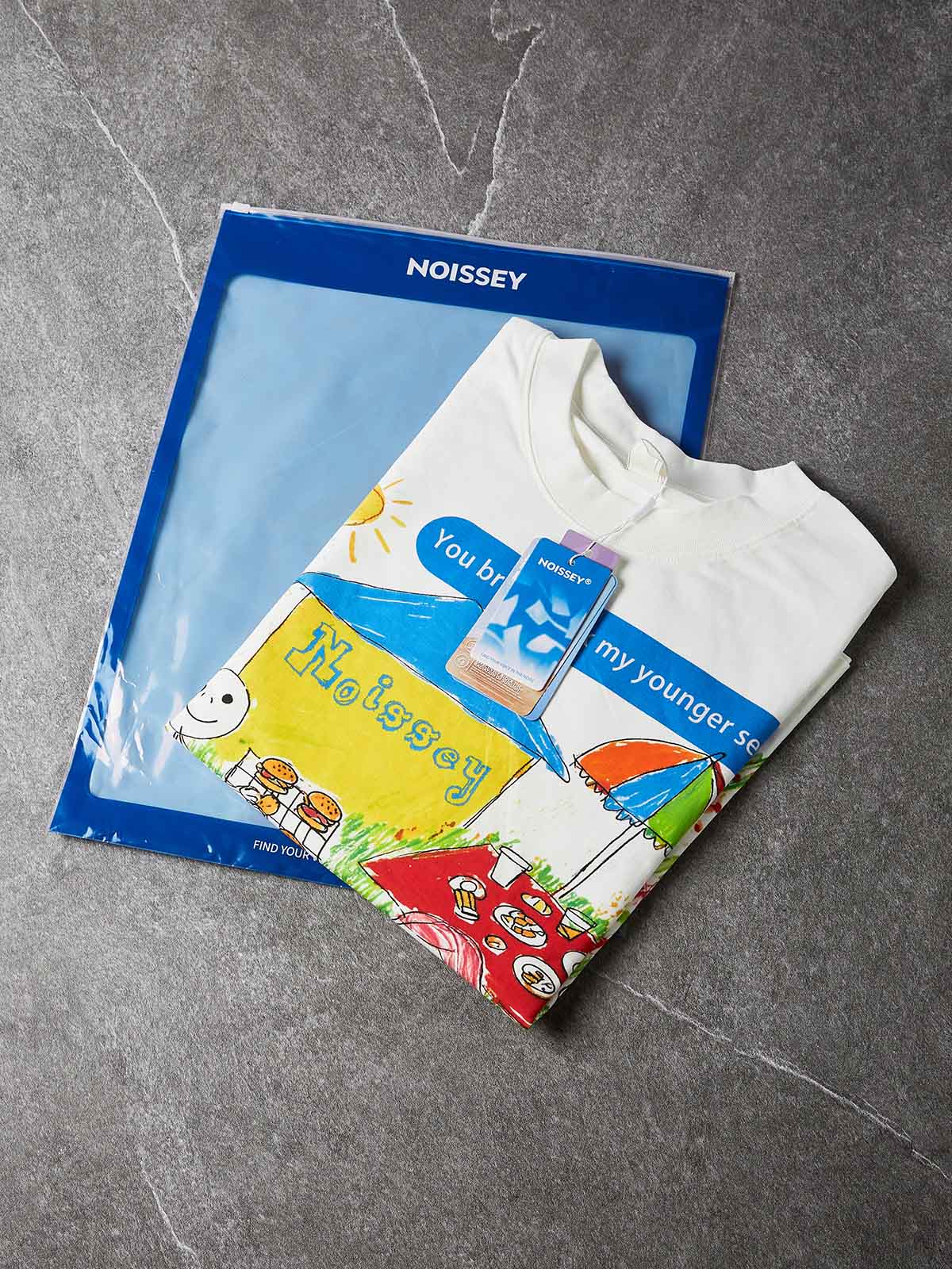 NOISSEY "Younger Self" Crayon Picnic Graphic Oversized Tee - Studio White