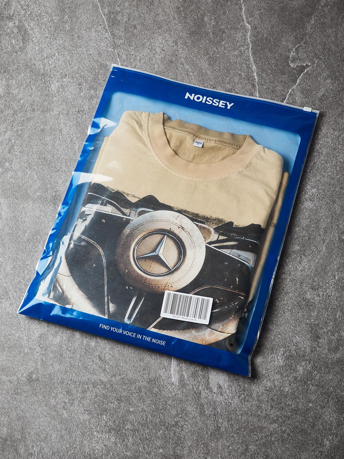 NOISSEY „Instant Luxury“-Vintage-Washed-Grafik-T-Shirt – Retro-Sandfarben