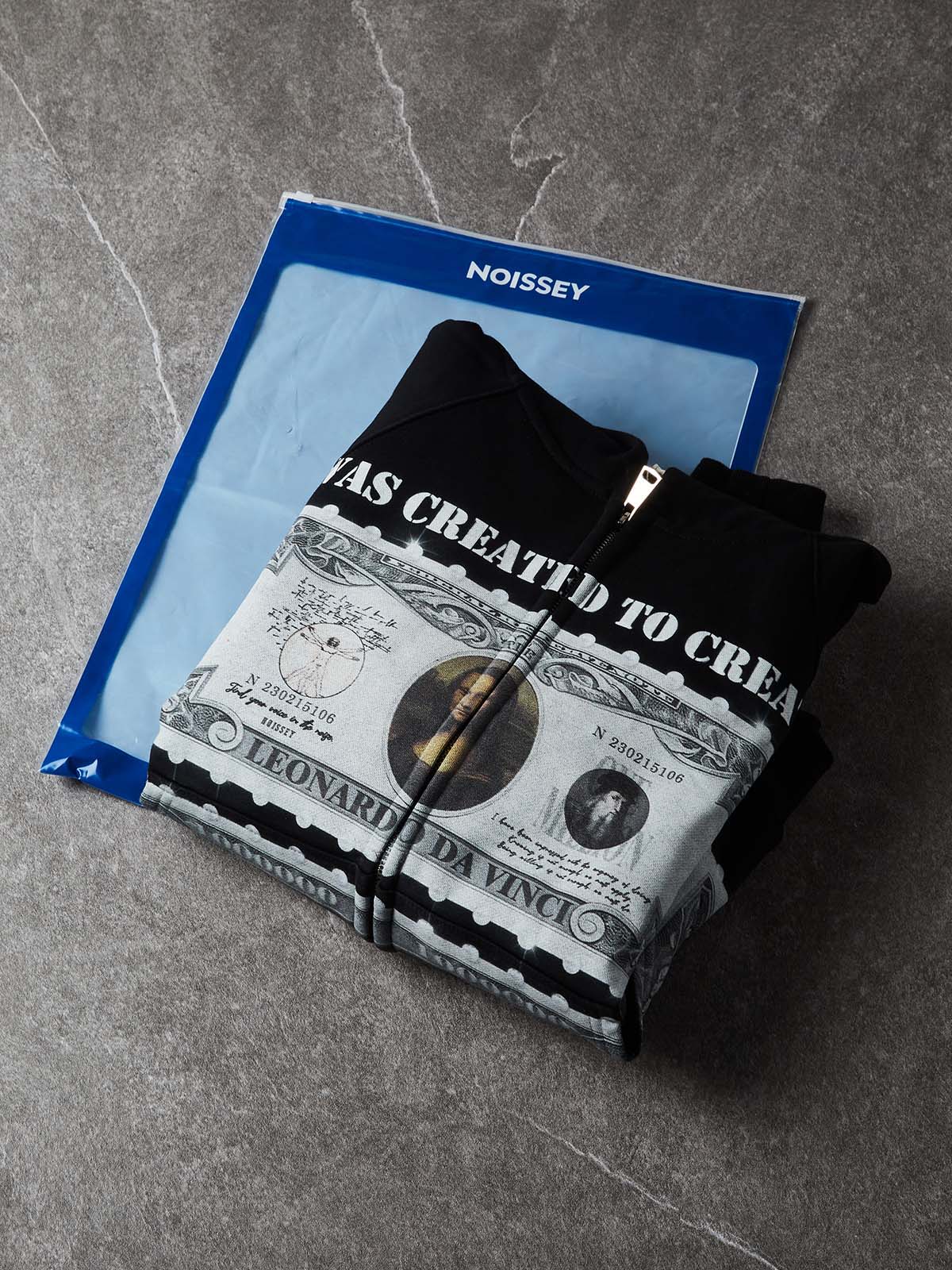 Felpa con cappuccio NOISSEY con grafica del timbro del dollaro sul capolavoro di Da Vinci e chiusura integrale con cerniera - Nero corvino