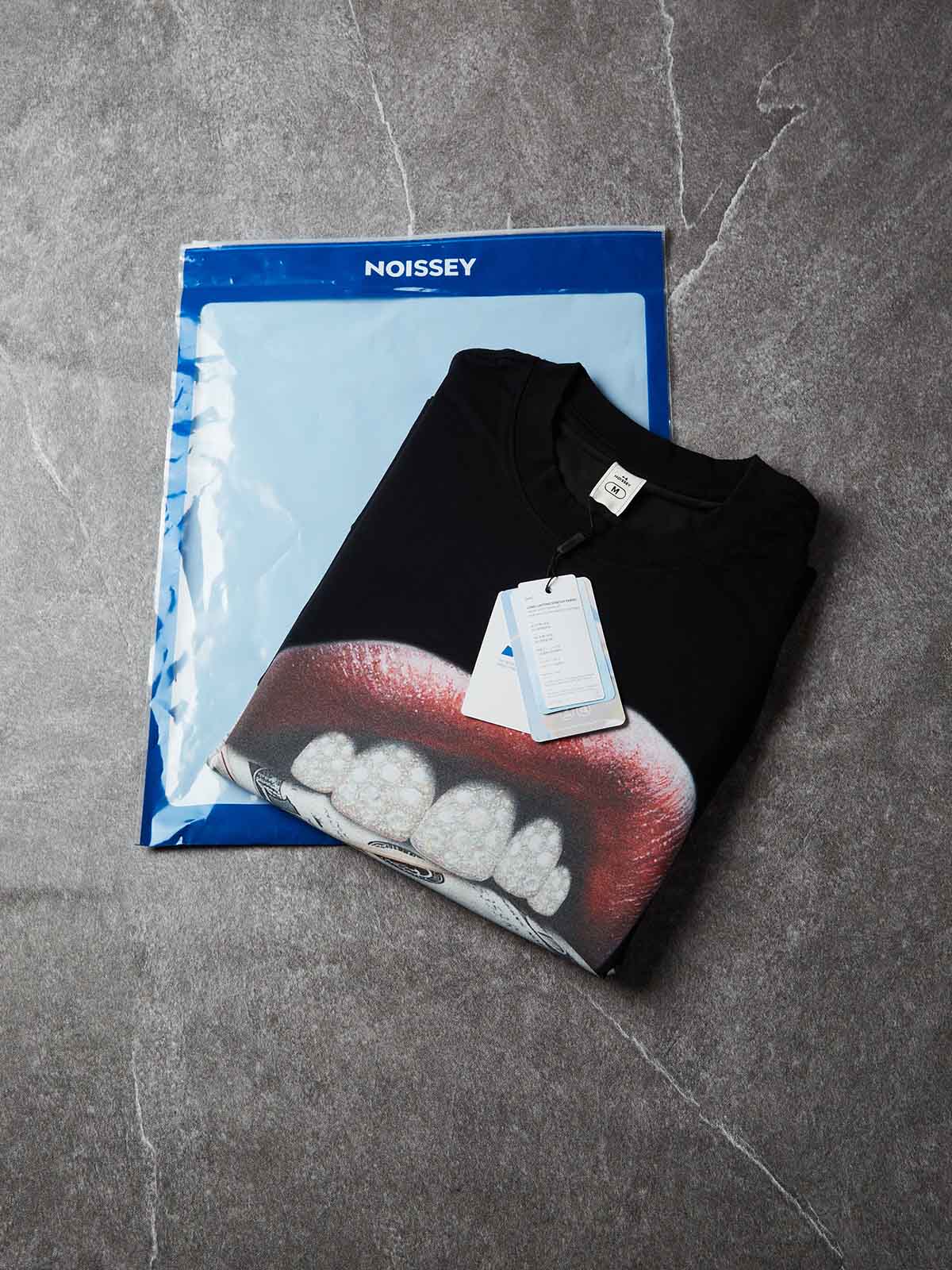 Boxy-Oversize-T-Shirt mit Lippen, die Geldscheine beißen, und Diamant-Grillz