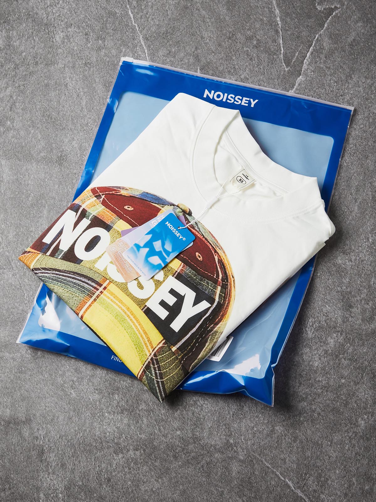 NOISSEY Always Real Plaid Cap Kid Graphic Boxy Tee - Streetwear T-Shirt