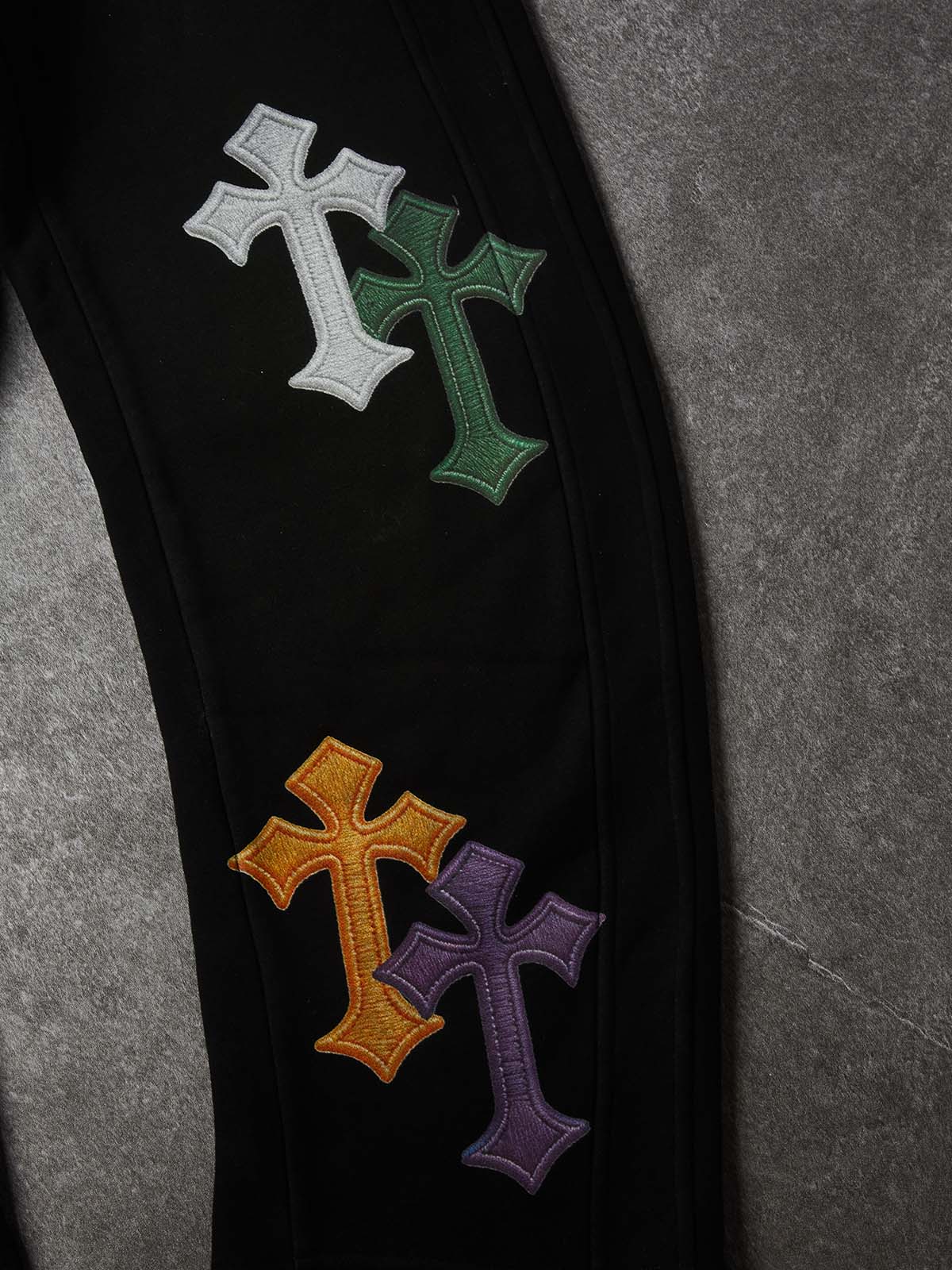 NOISSEY "Multi-Color Faux-Embroidery Cross" Curved Long Pants