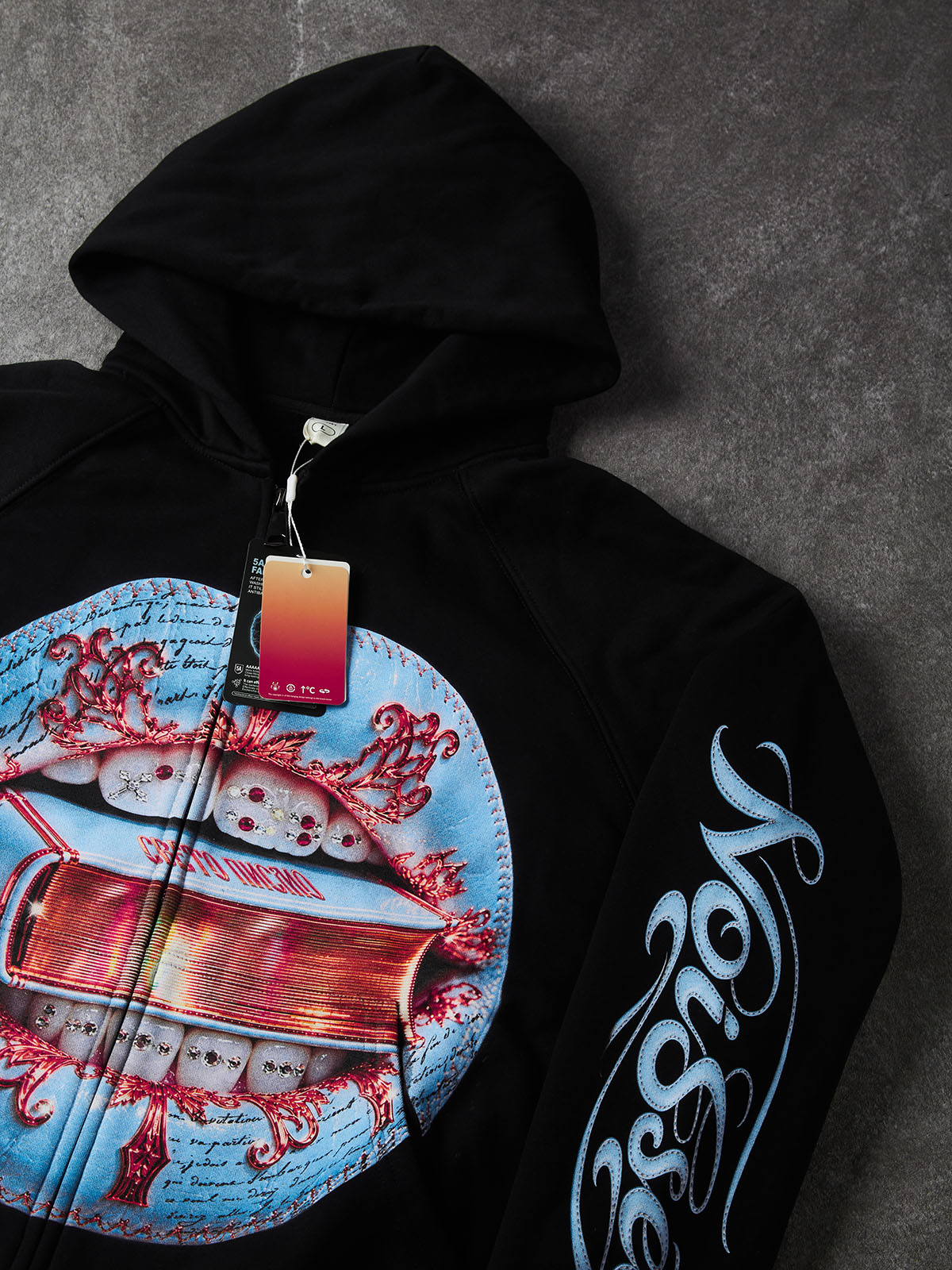 NOISSEY Light Blue Stitched Leather Lips & Holy Scripture Bible Zip-Up Black Hoodie