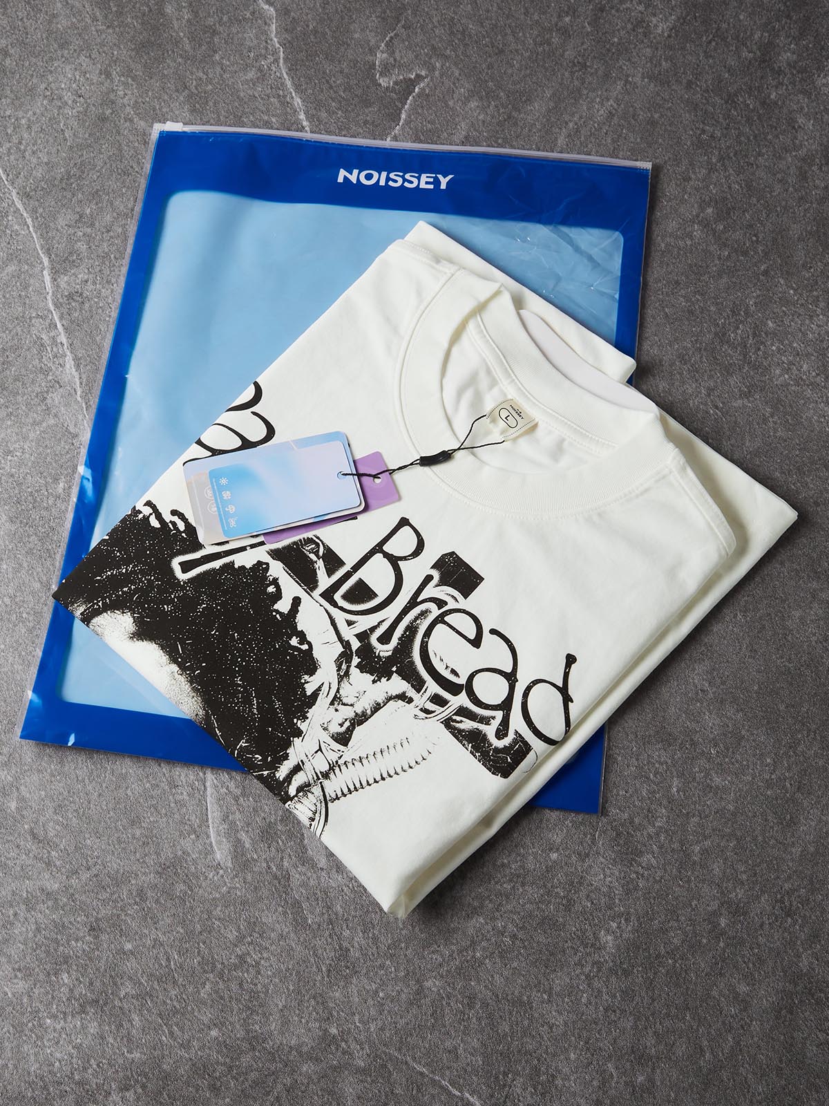 NOISSEY "Daily Bread" Breathing Mask Child & Faith Graphic White T-Shirt