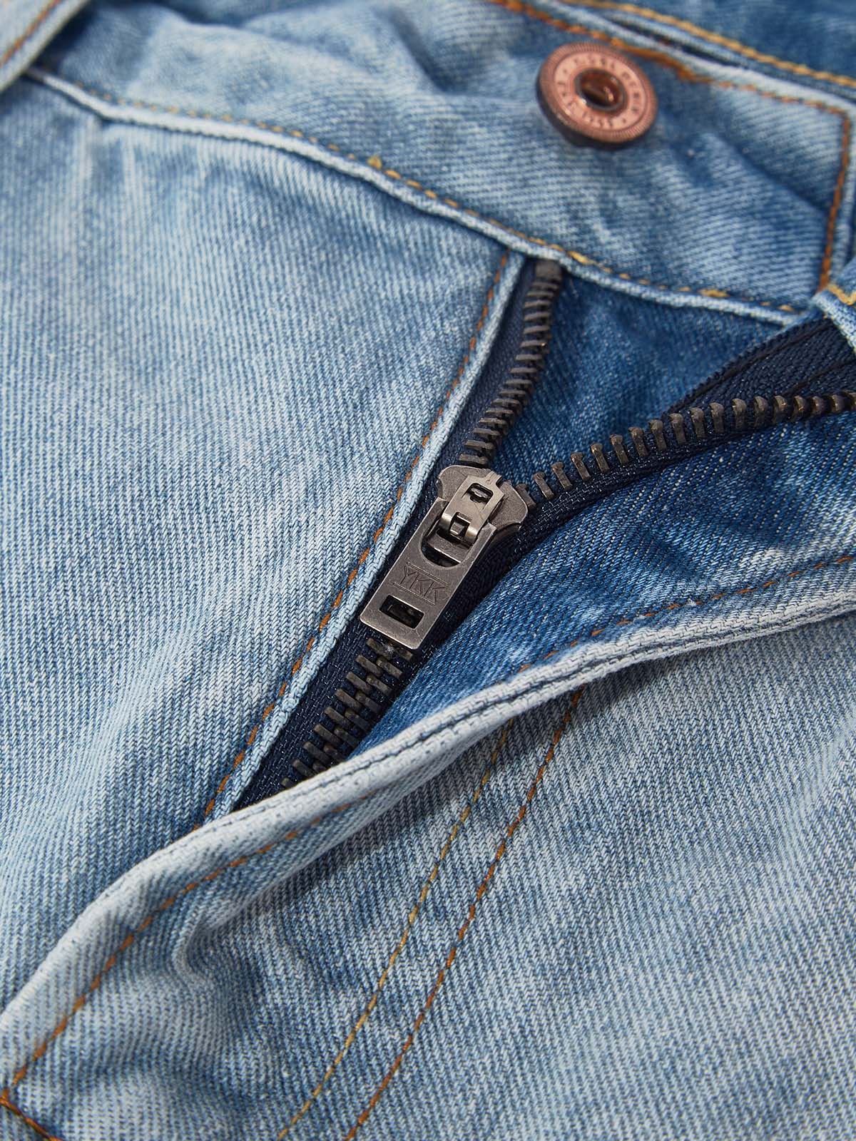 OBSTACLES &amp; DANGERS© Zerrissene Jeans mit Buntglas-Print
