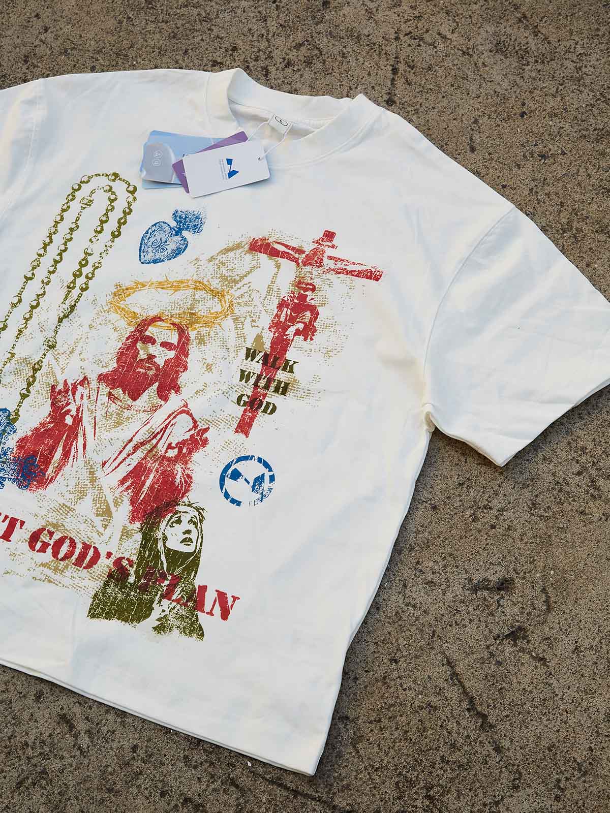 White T-shirt with colorful "Trust God's plan" screen print
