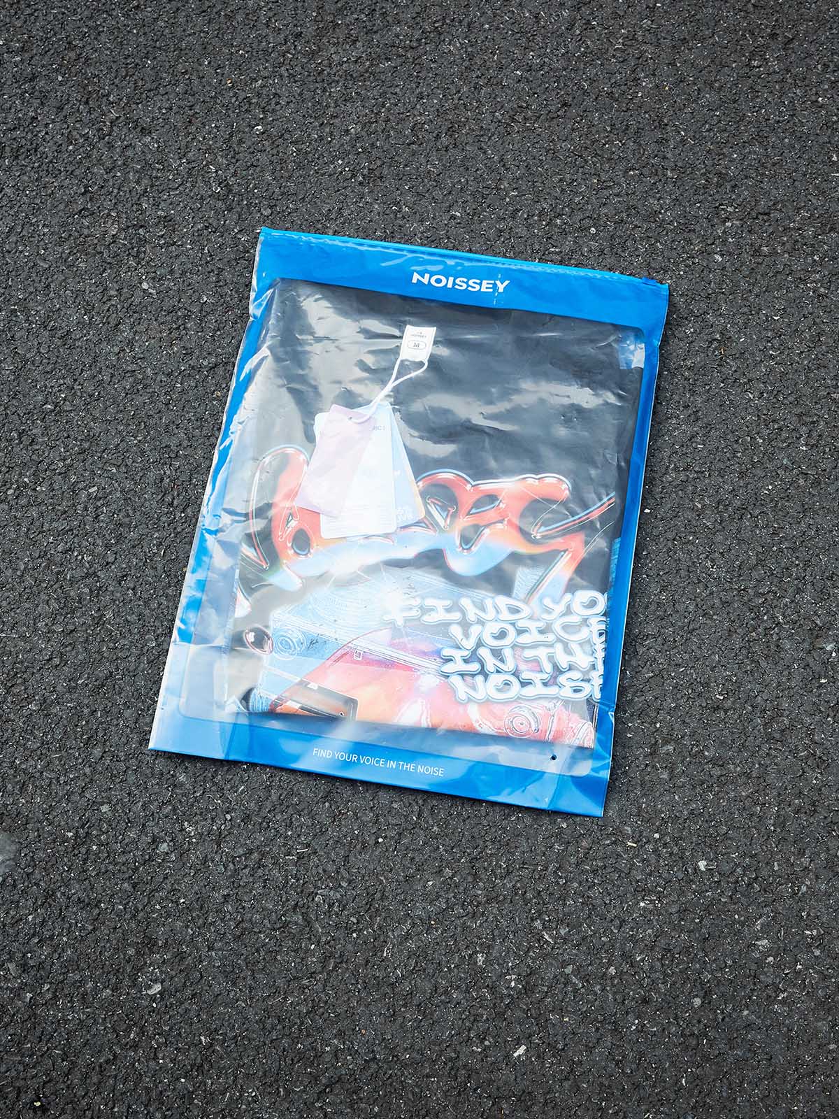 NOISSEY "Find Your Voice" Chrome Grillz Graphic Tee – Black