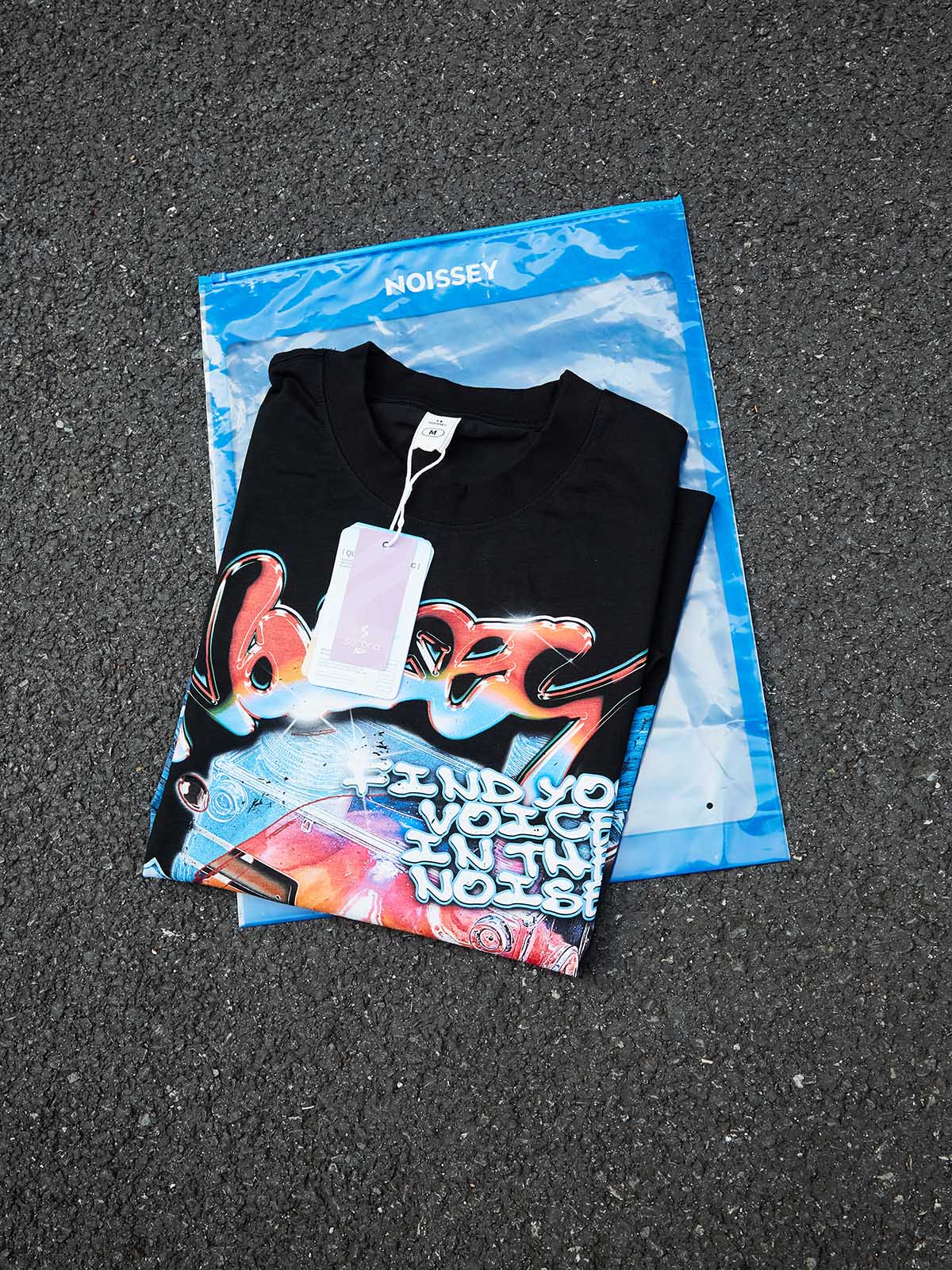 NOISSEY "Find Your Voice" Chrome Grillz Graphic Tee – Black