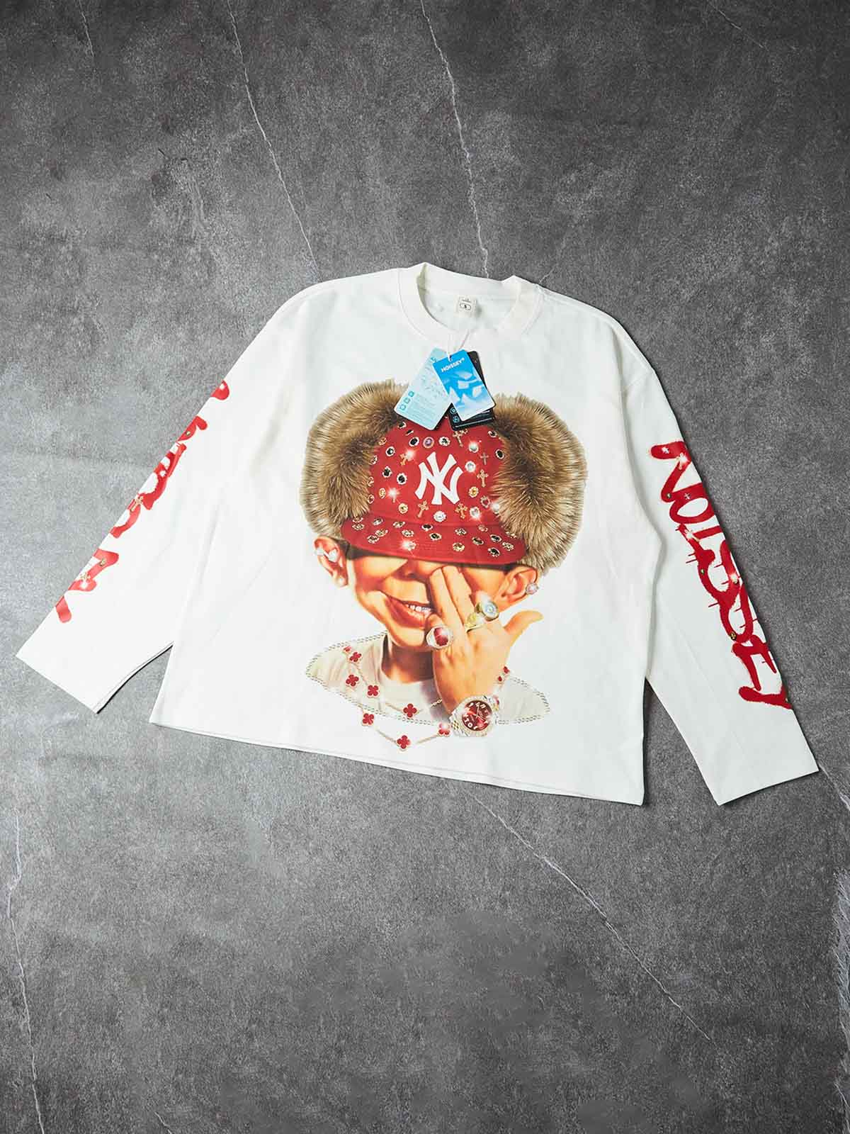 NOISSEY ICED OUT RED CAP FIGURE GRAPHIC LONG SLEEVE STREETWEAR SHIRT