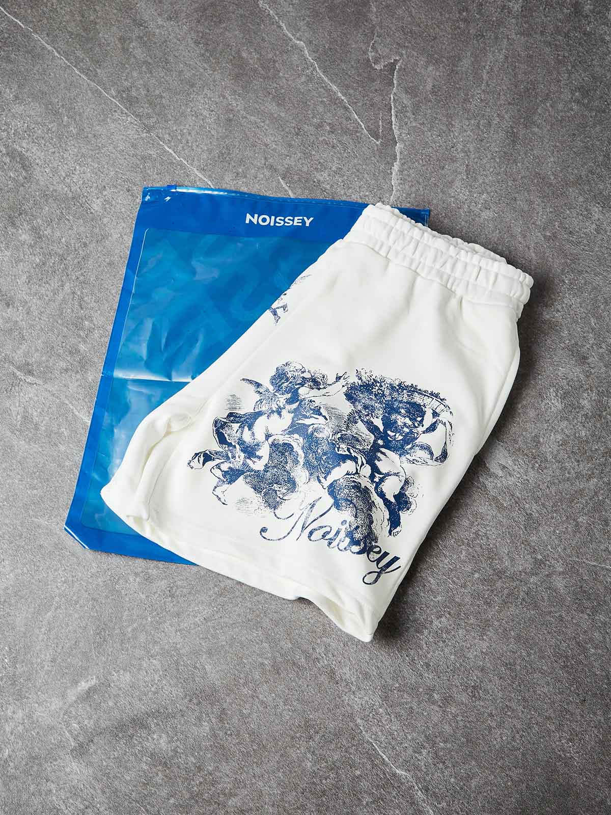 NOISSEY "Blue Angel" Cross & Cherub Graphic Heavyweight Wide-Leg Sweat Shorts