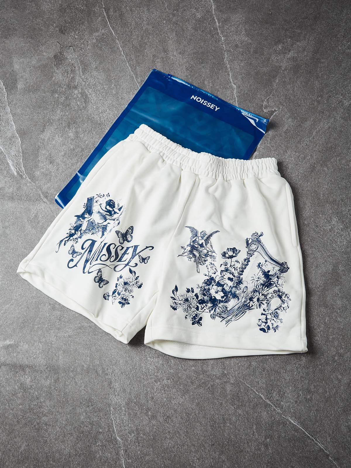 NOISSEY "Heavenly Garden" Blue Angel & Floral Art Print White Wide-Leg Shorts