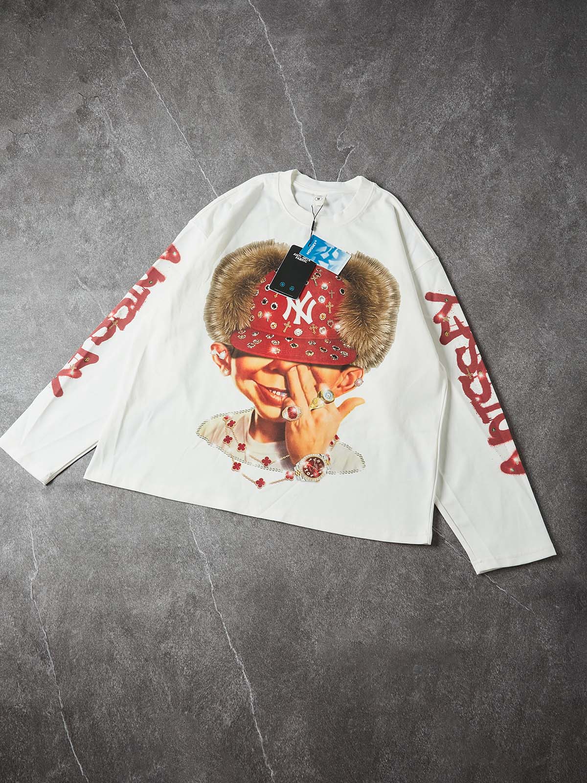 NOISSEY ICED OUT RED CAP FIGURE GRAPHIC LONG SLEEVE STREETWEAR SHIRT