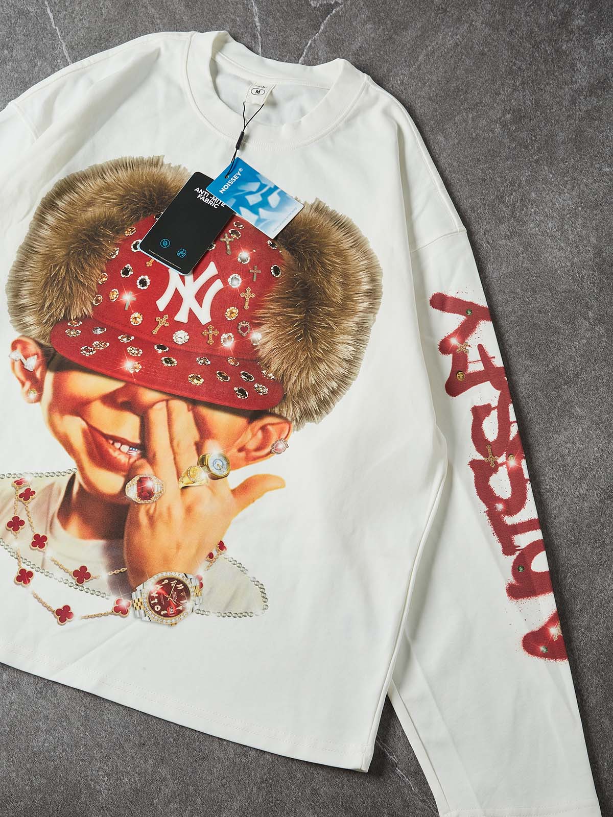 NOISSEY ICED OUT RED CAP FIGURE GRAPHIC LONG SLEEVE STREETWEAR SHIRT