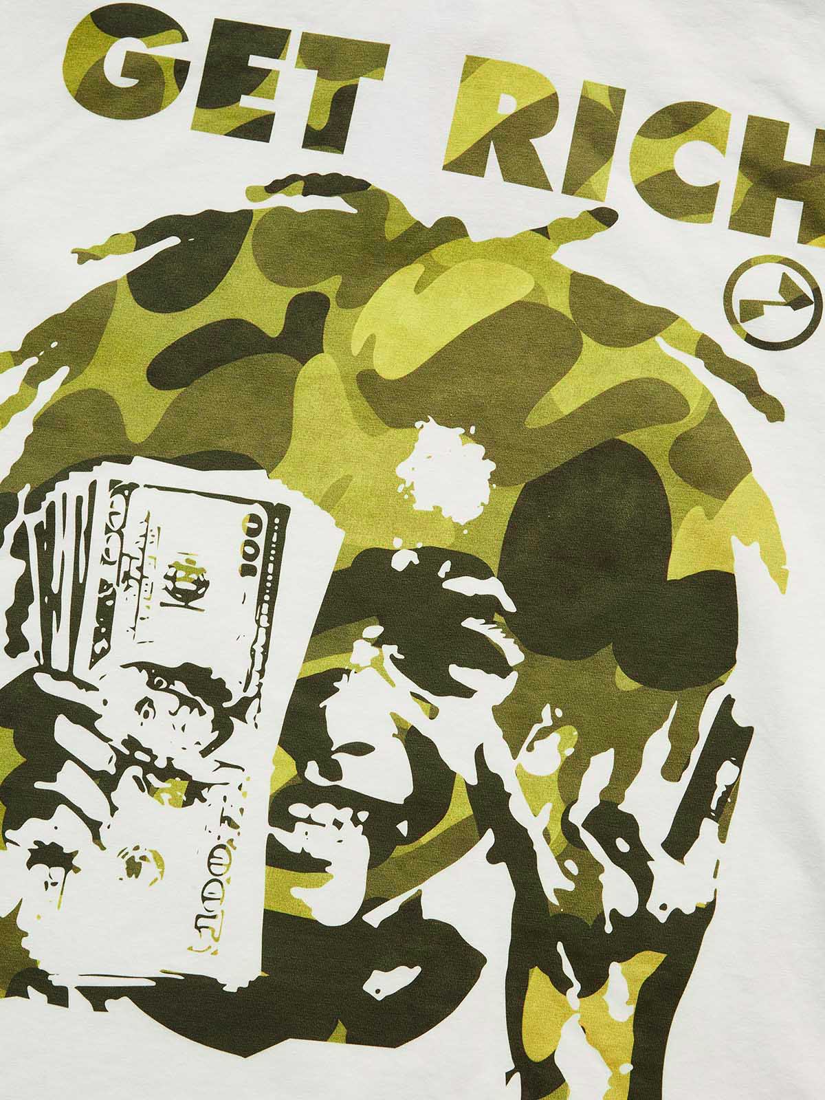 Close-up of green camo silhouette and money graphic print on white cotton tee
