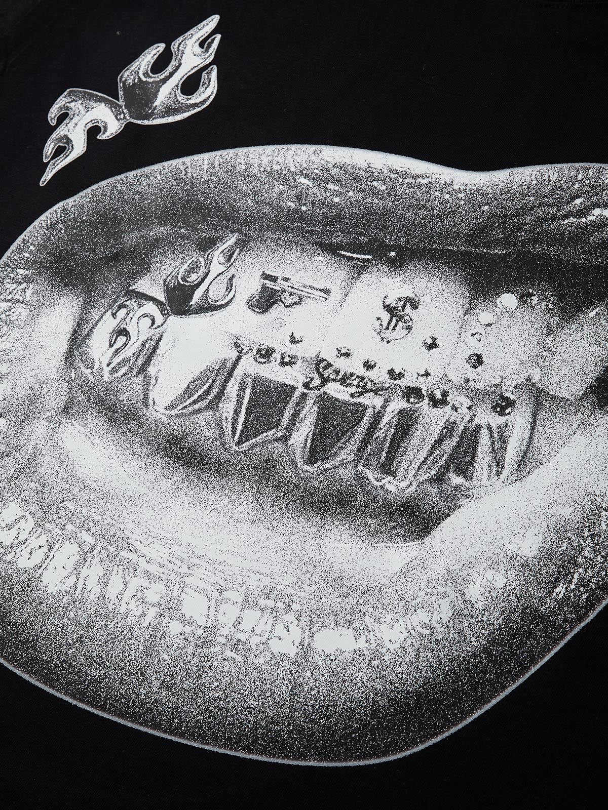 Close-up of lips graphic biting grillz engraved with gun, dice, and flame icons