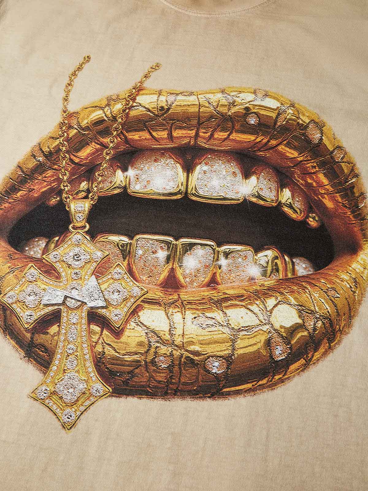 Close-up of molten gold lips biting a diamond cross chain and iced out grillz