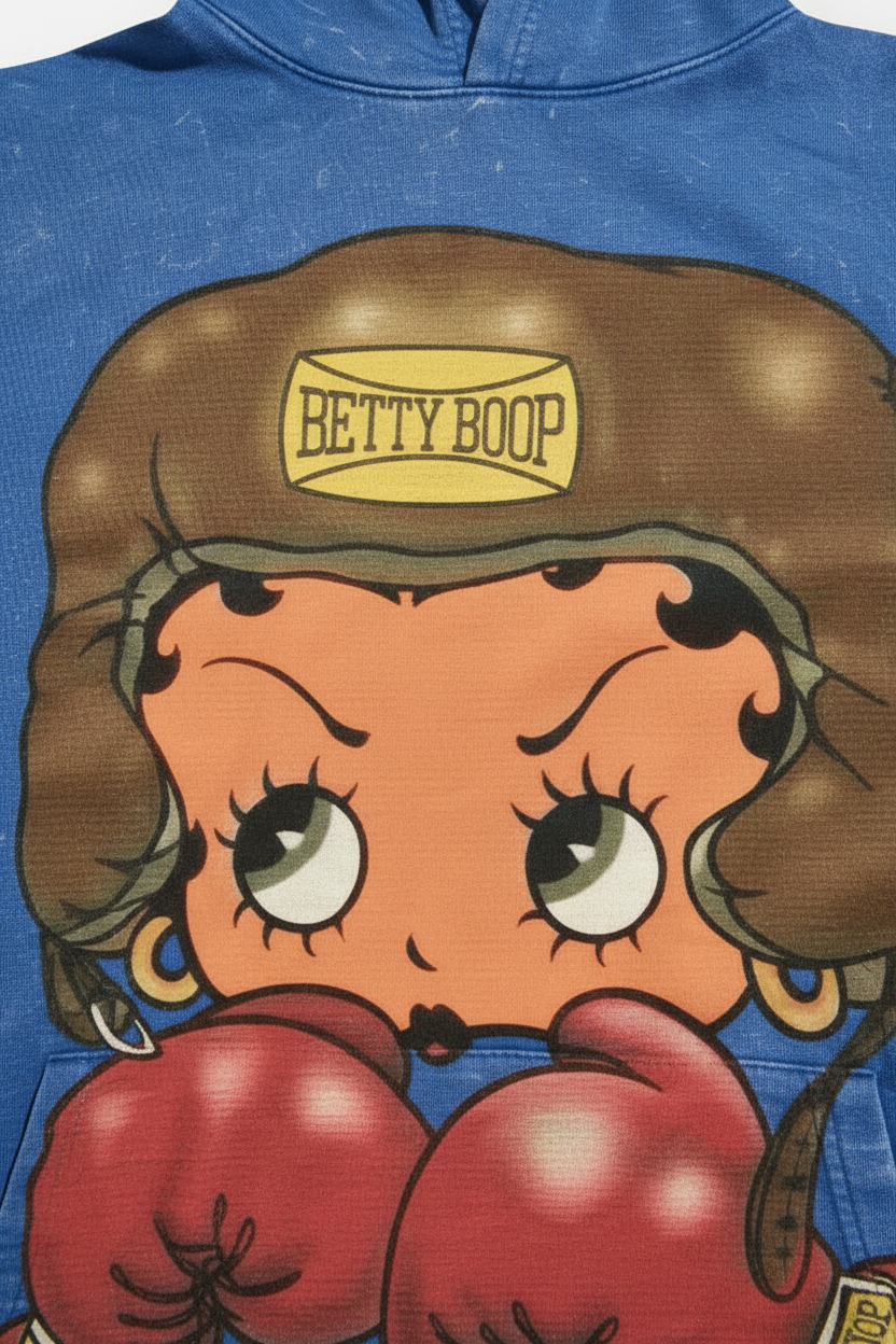 Close-up of retro cartoon girl wearing boxing gloves graphic print