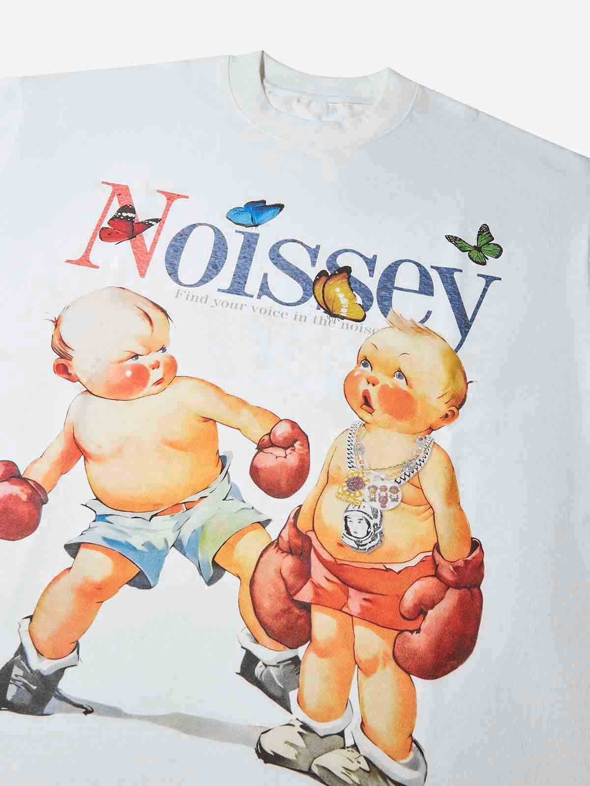 Close-up of retro illustration showing two toddlers boxing with oversized gloves and NOISSEY logo