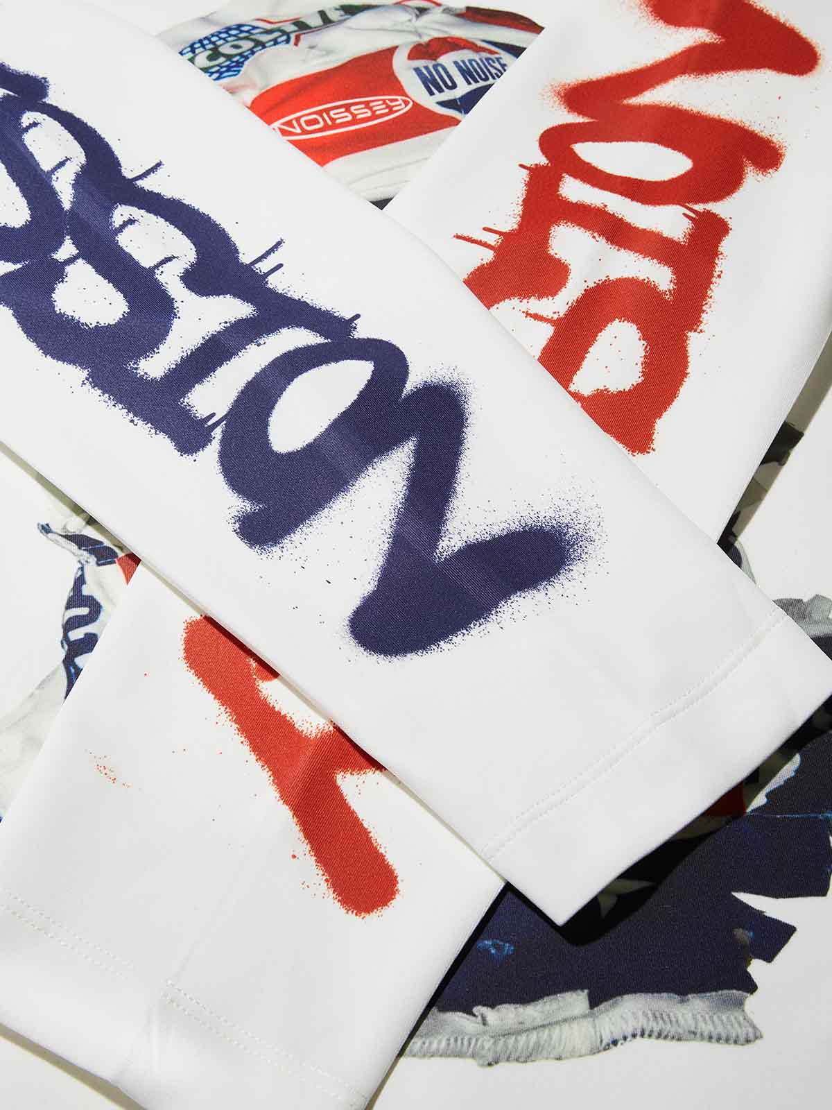 Close-up of the "HOUSTON" and "NOISSEY" graffiti text printed on the sleeves