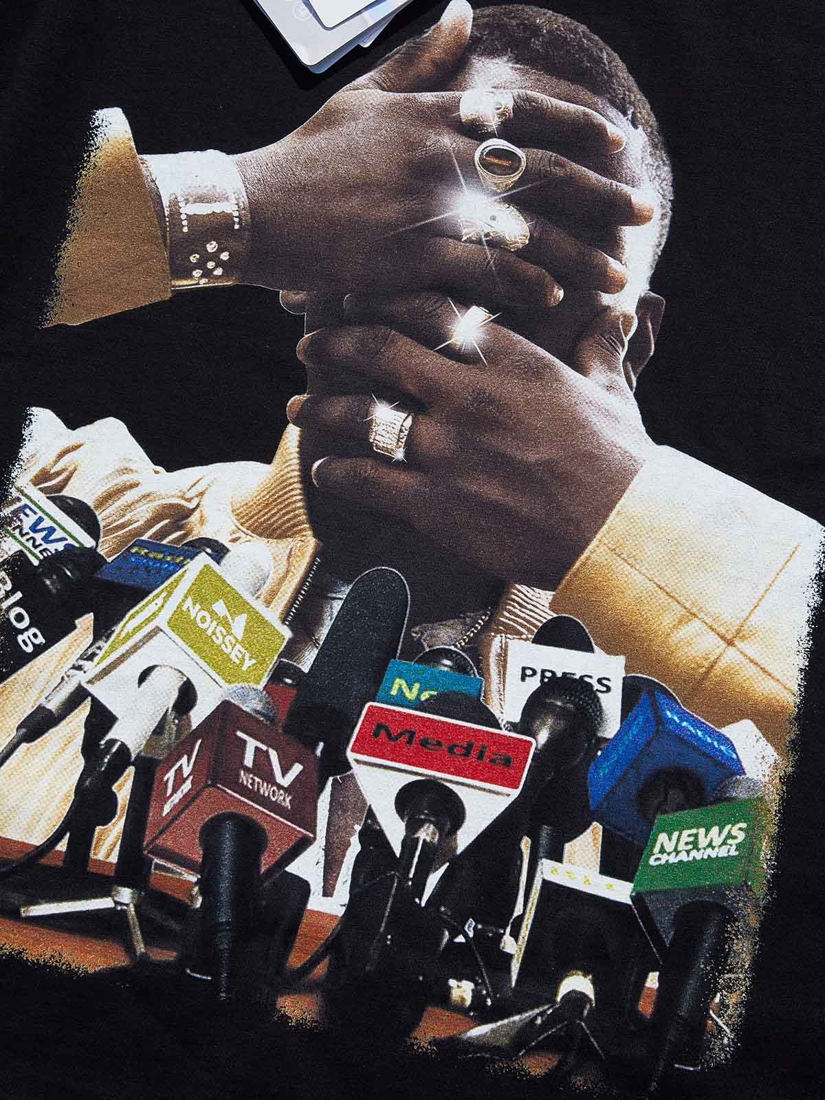 Close-up of the "Microphone Forest" art print on the t-shirt, highlighting the intricate details of microphones intertwined with trees.