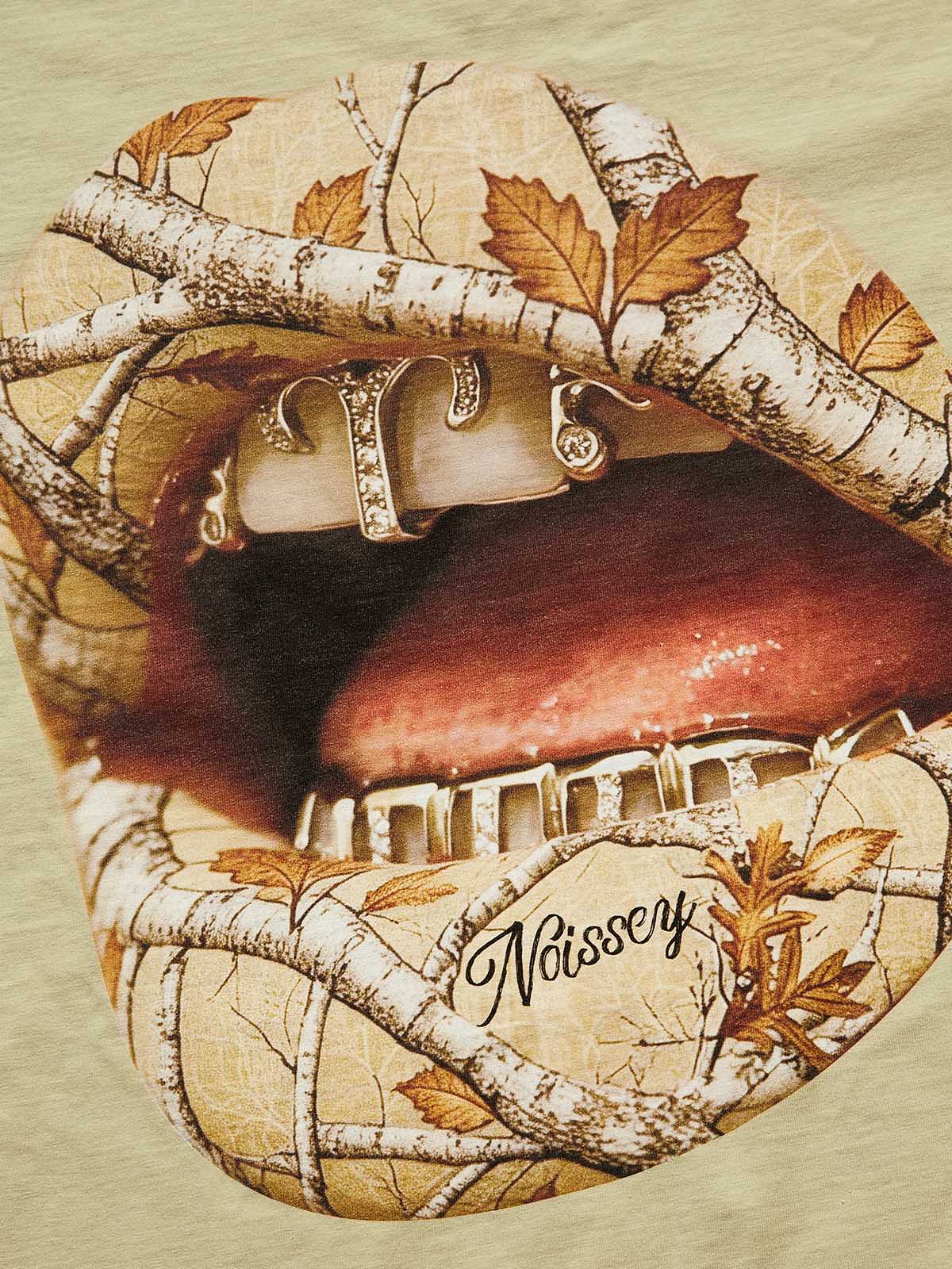 Close-up of the Real Tree camouflage pattern texture blended with a grillz mouth design