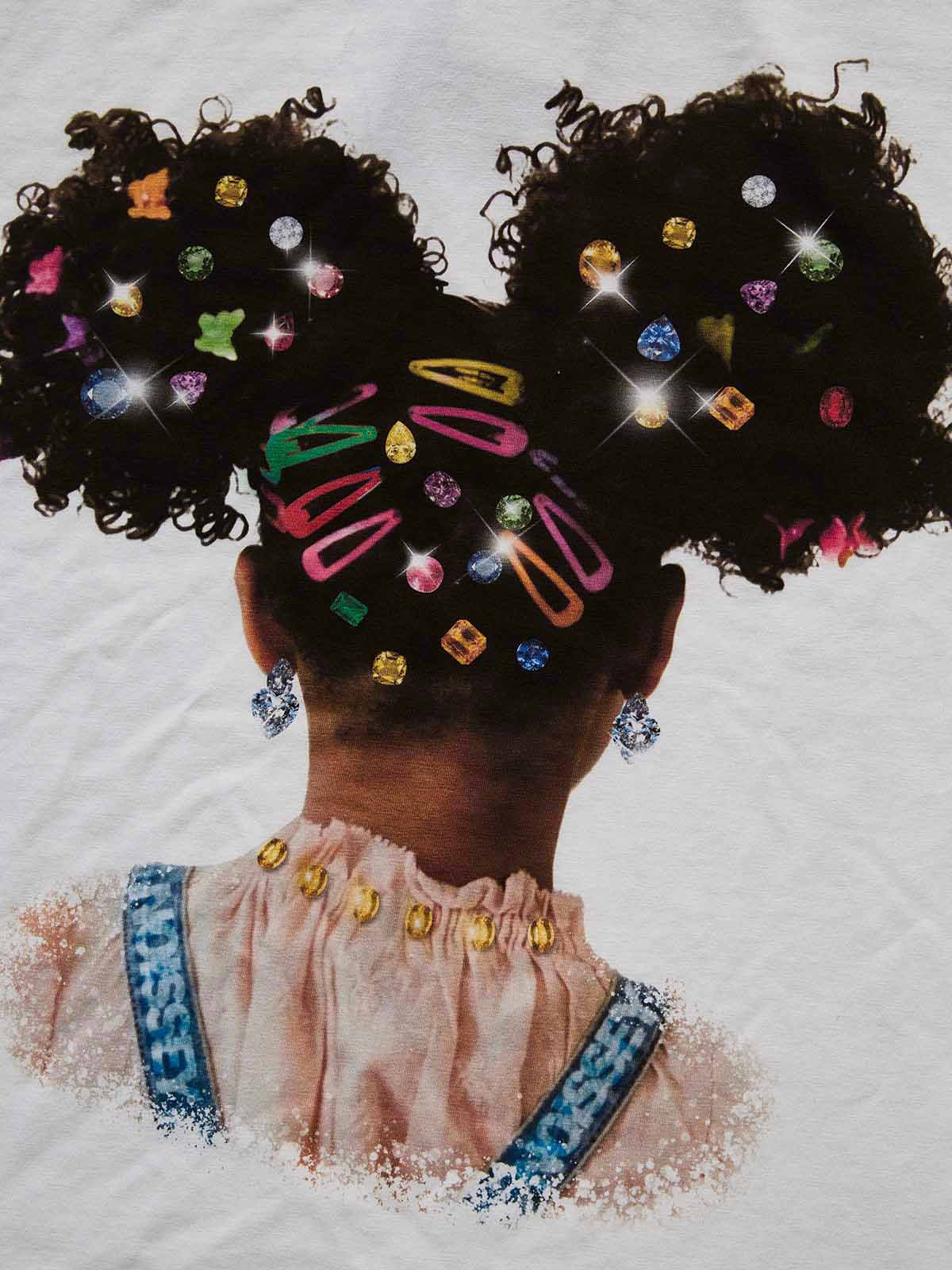 Close-up of the afro puffs hairstyle with sparkling rhinestone barrettes print