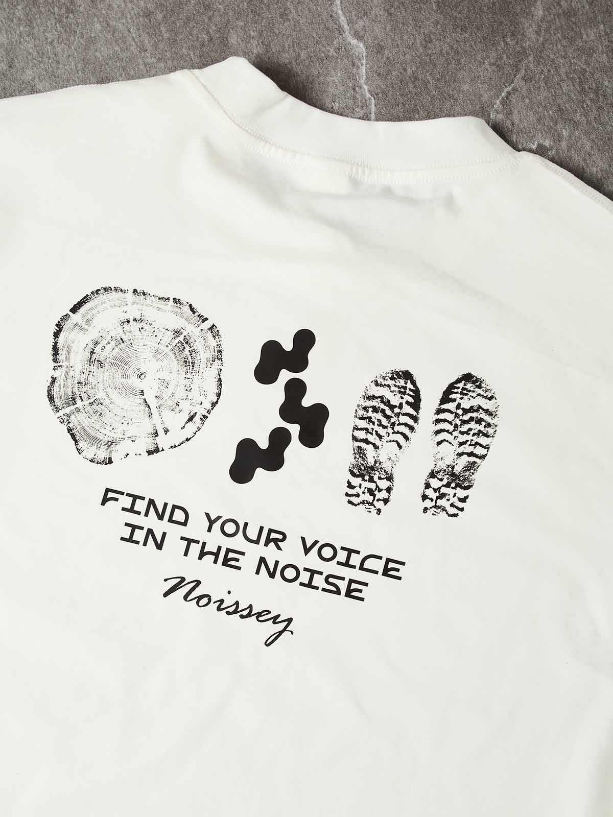 Close-up of the back graphic, showcasing the high-definition chrome gradient and the fluid, liquid-drip aesthetic of the typography.