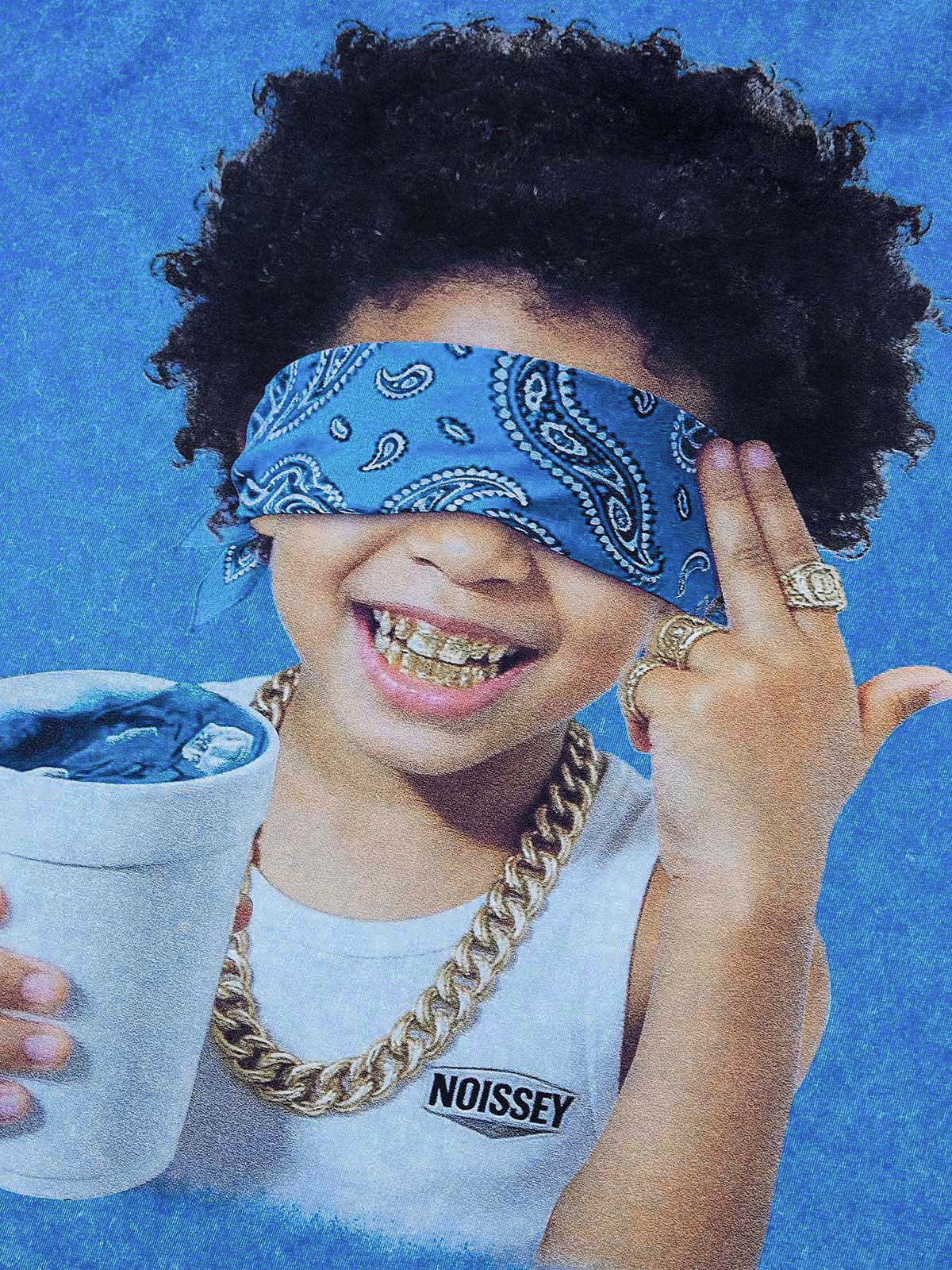 Close-up of the blue paisley headscarf blindfold and child's face print, showing the intricate details and washed effect.