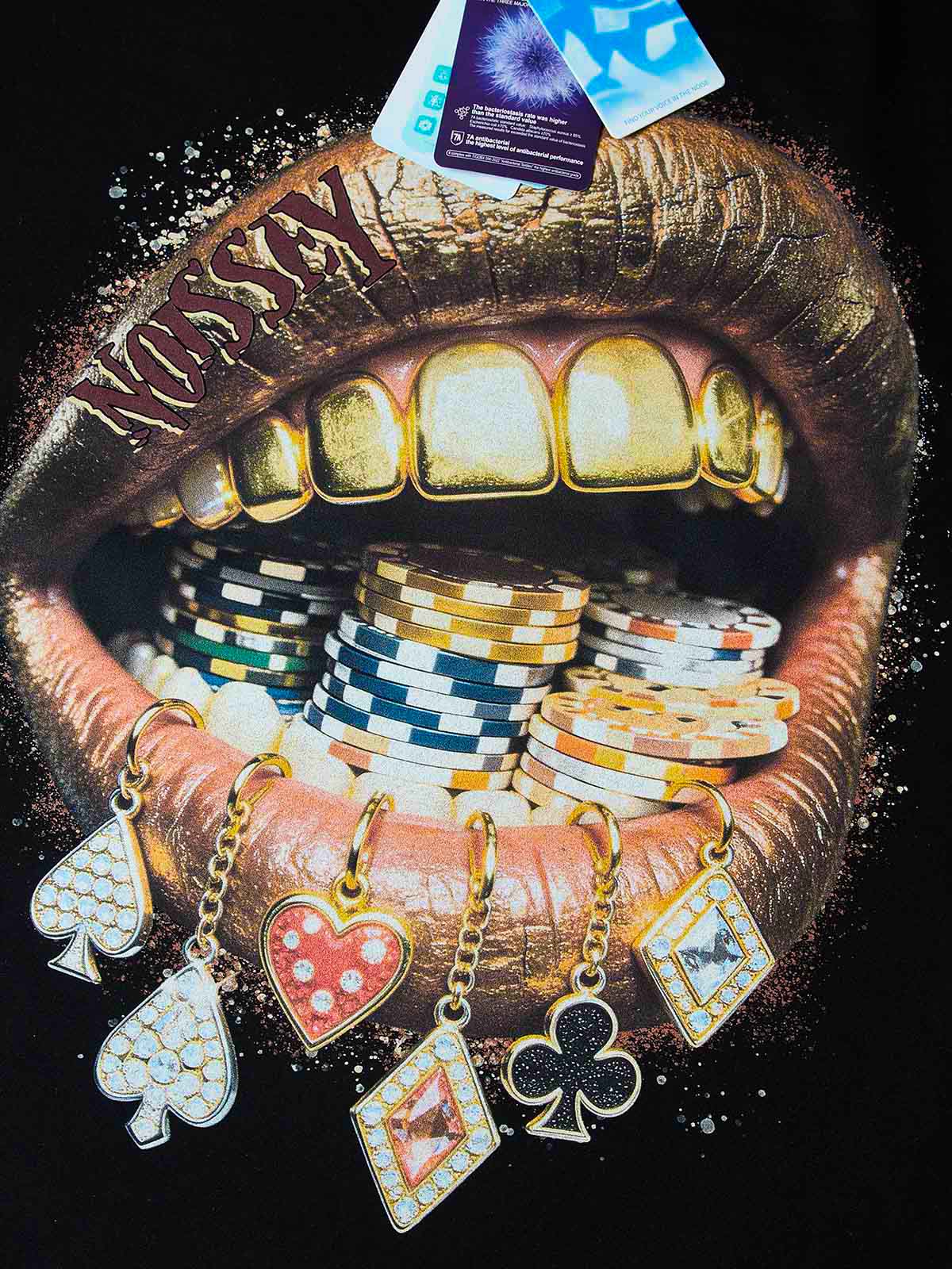 Close-up of the gold grills and the texture of the poker chips, showcasing the high-definition stipple print quality and shimmering metallic finish.