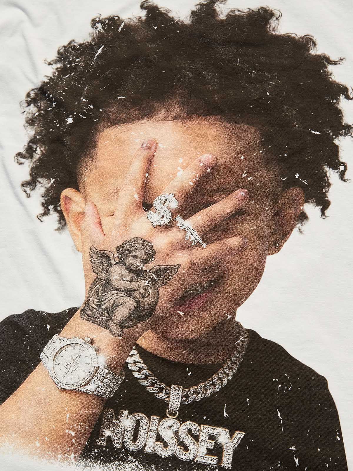Close-up of the high-quality digital print showing the angel tattoo, diamond watch, and "NOISSEY" iced-out chain detail.