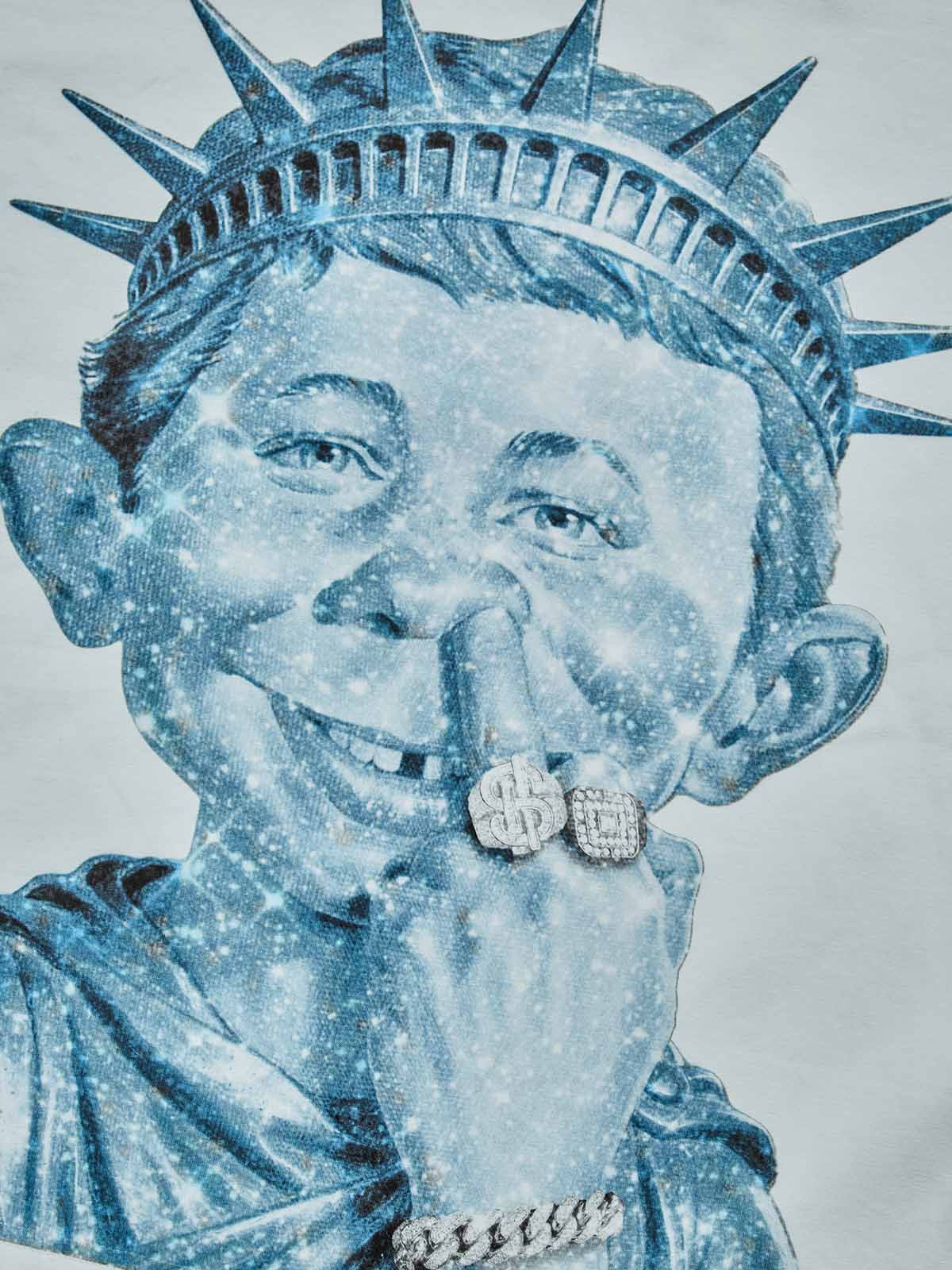 Close-up of the shimmering blue rhinestones and intricate "bad boy" character art.