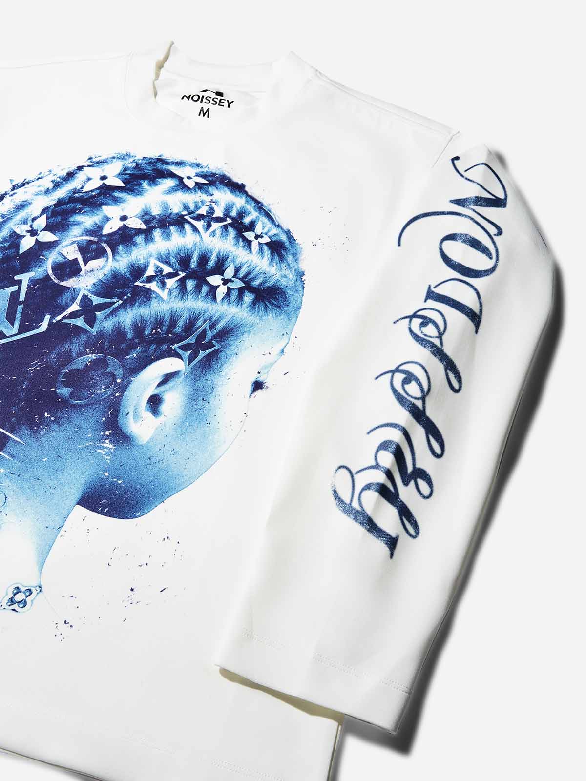 Detail of blue gothic calligraphy text printed on the white sleeves