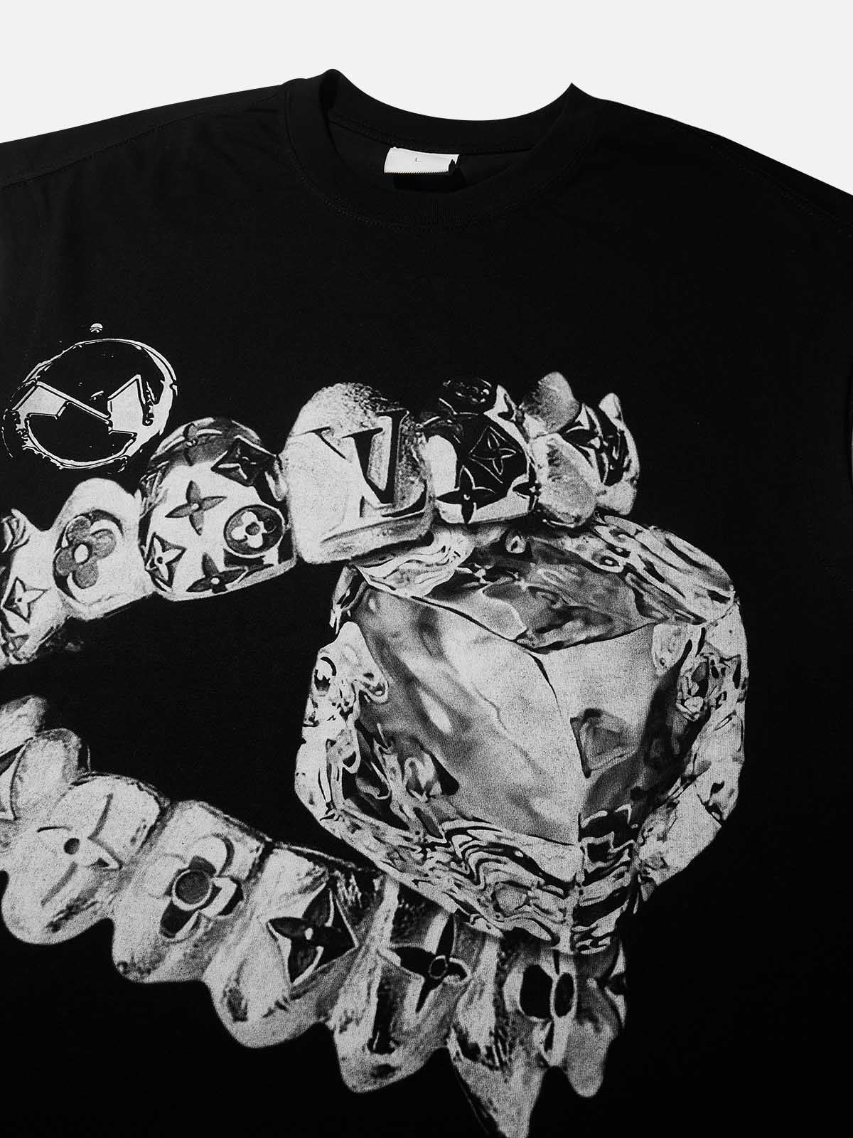 Detail of the liquid metal grillz biting a diamond ice cube graphic on the black t-shirt