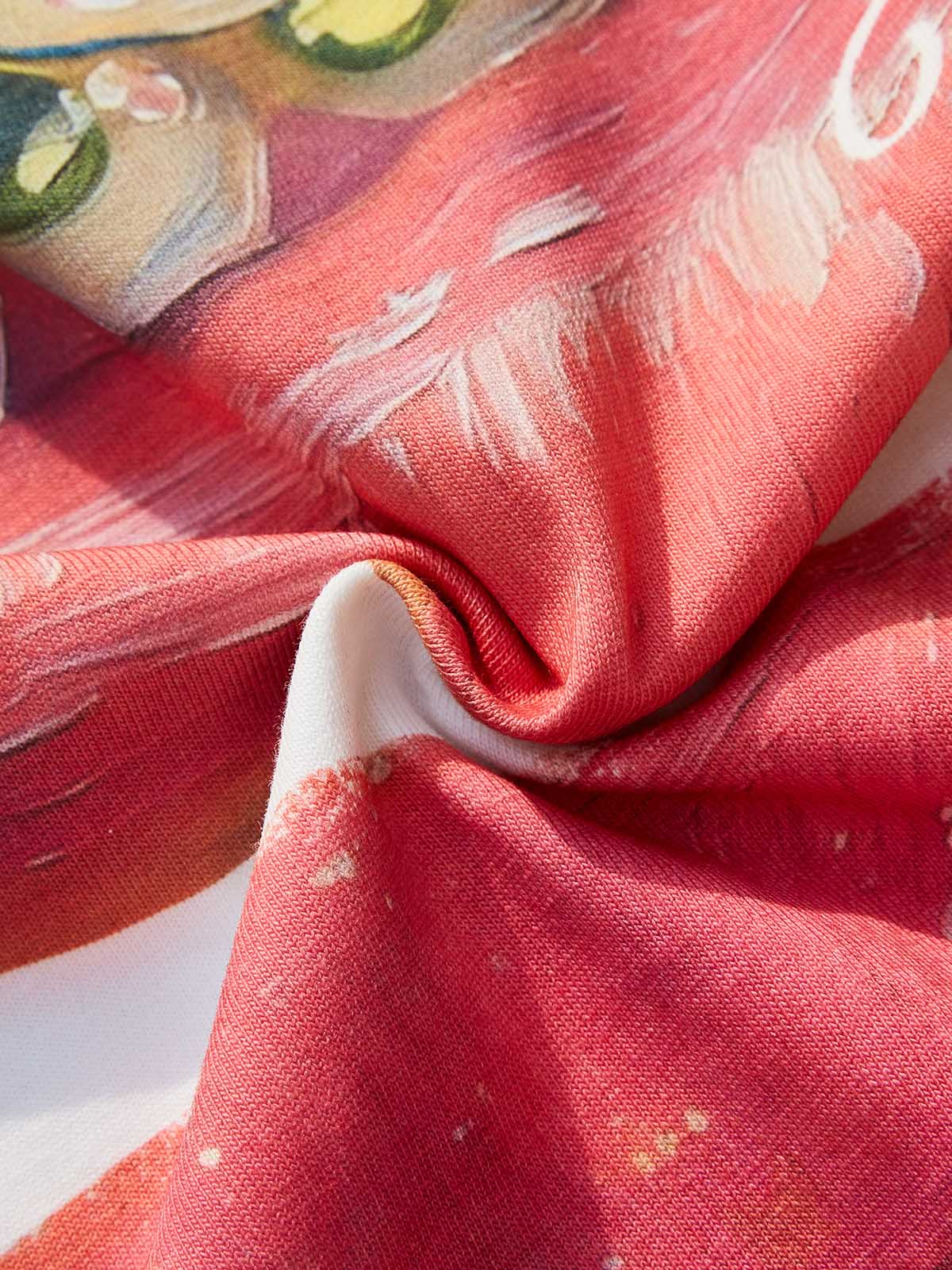 Detail showing the high-quality cotton fabric texture of the graphic tee