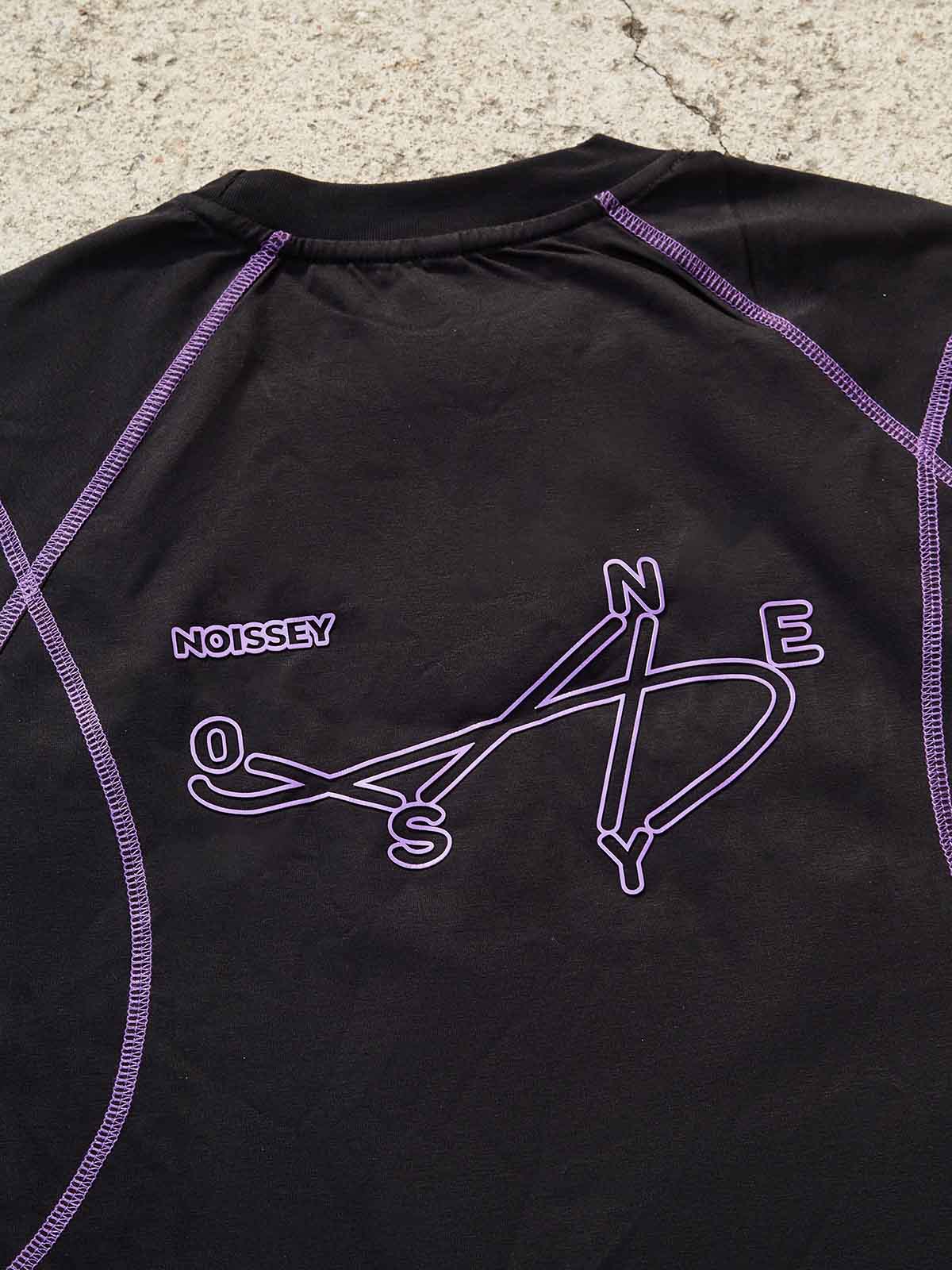 Detailed view of the abstract soundwave and 'NOISE' typography art on the back of the shirt.