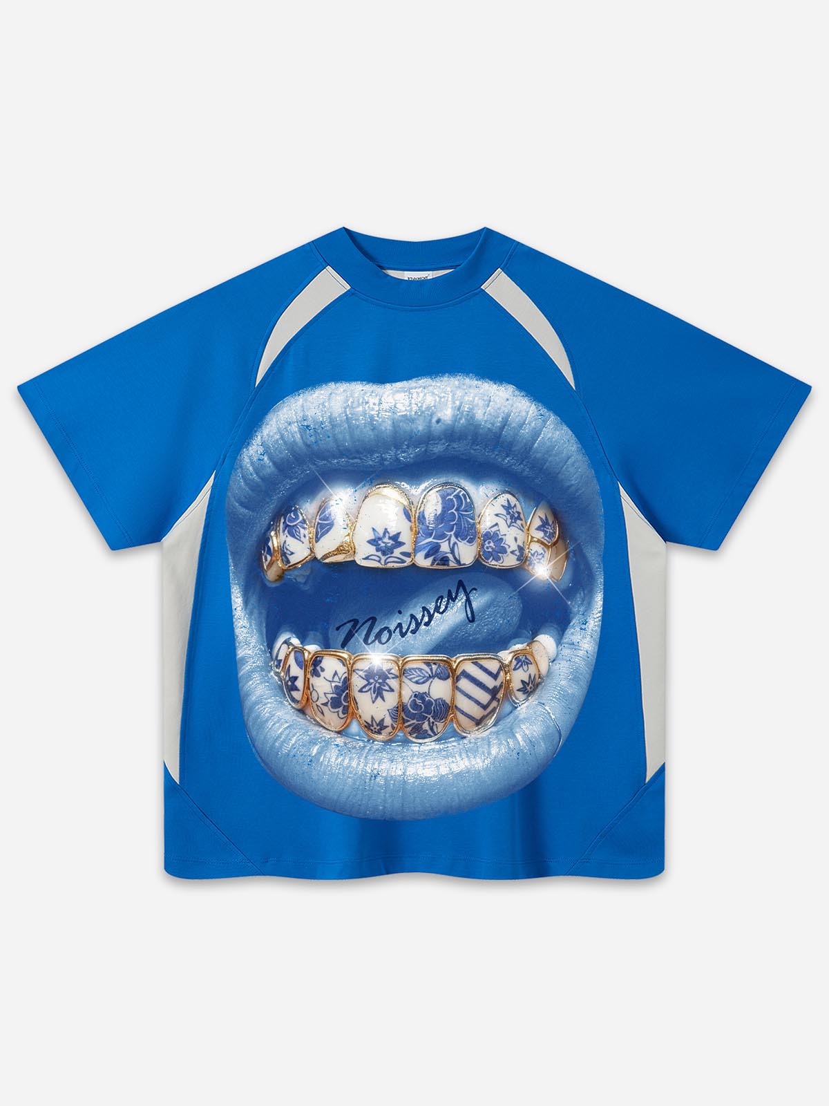 Front view of a vibrant blue raglan t-shirt featuring a large, shimmering graphic of open lips with blue-and-white porcelain patterned grillz.