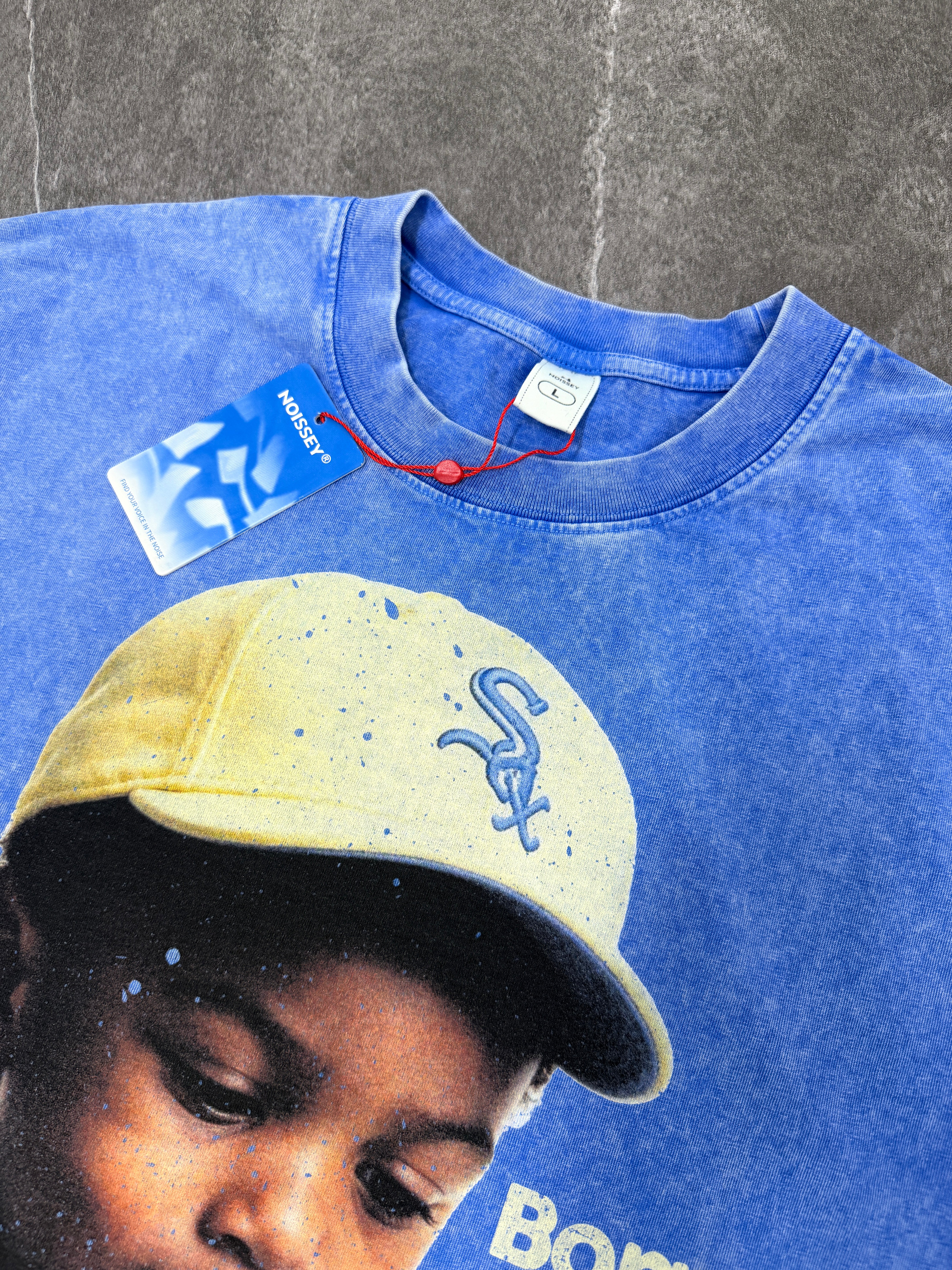 NOISSEY "Born Broke Die Rich" Yellow Cap Kid Graphic Acid-Washed Blue T-Shirt