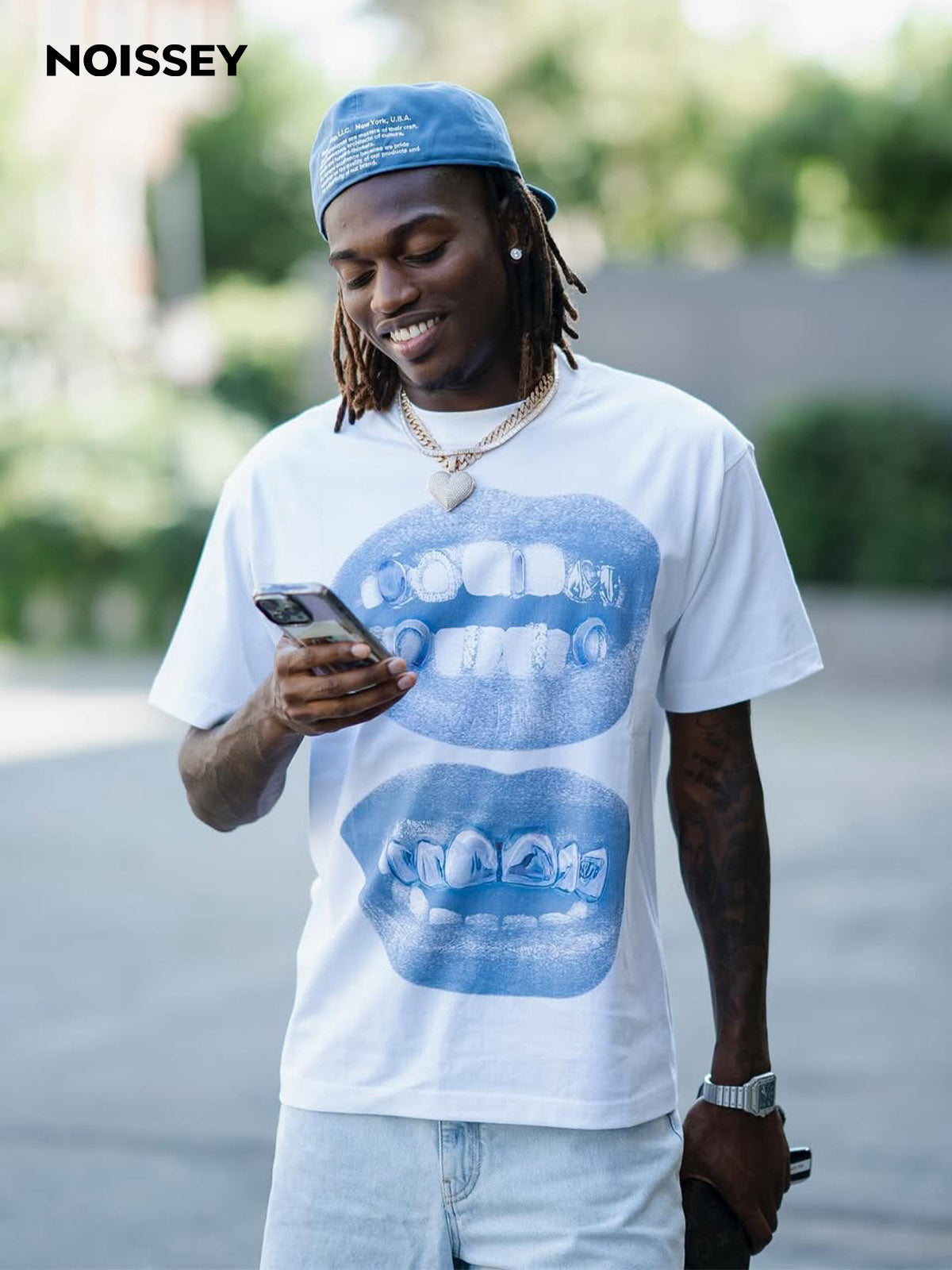 Male model wearing the standard fit heavy tee showing regular length (not cropped)