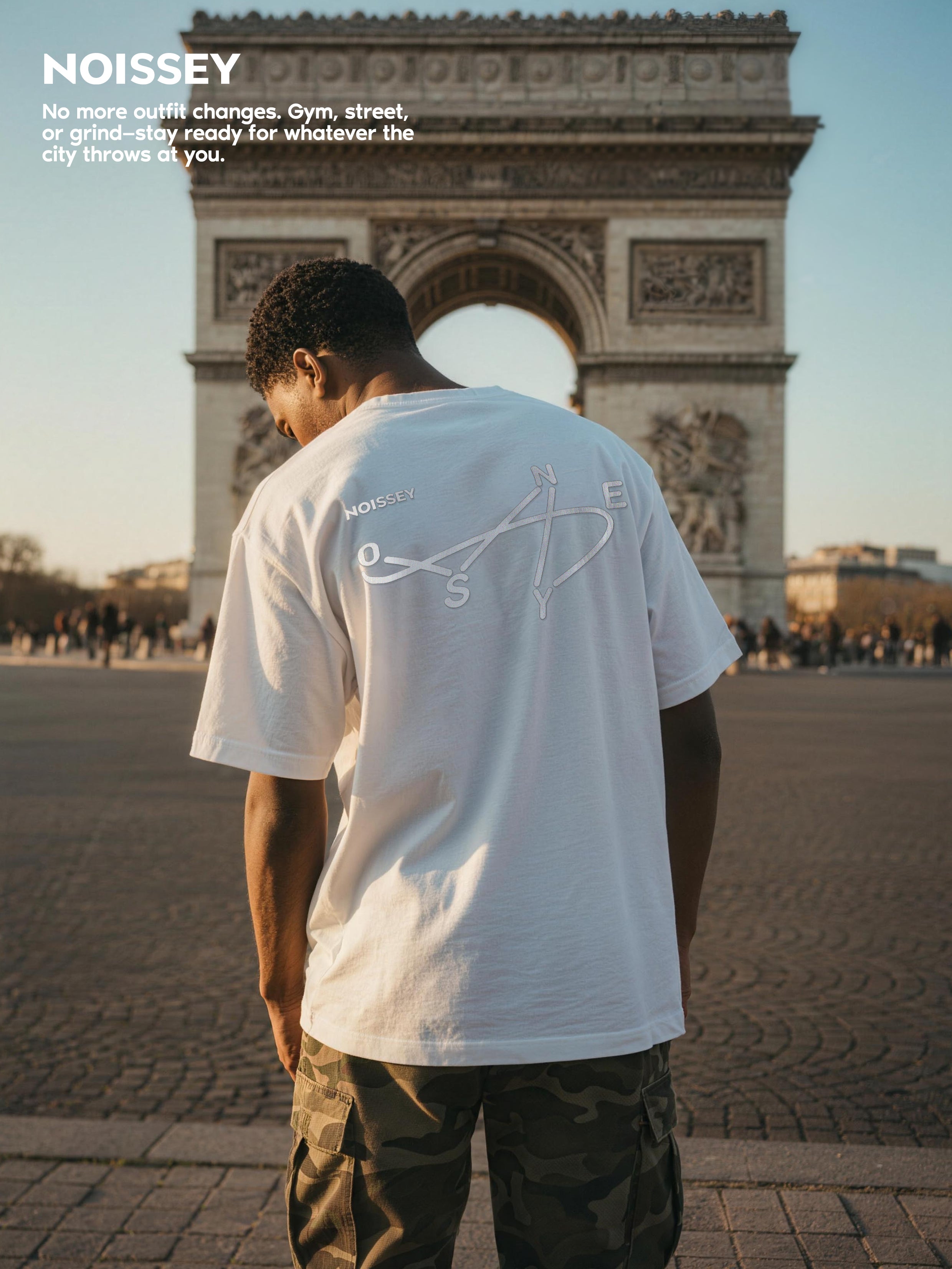 Man wearing NOISSEY cooling tee while hiking on a trail