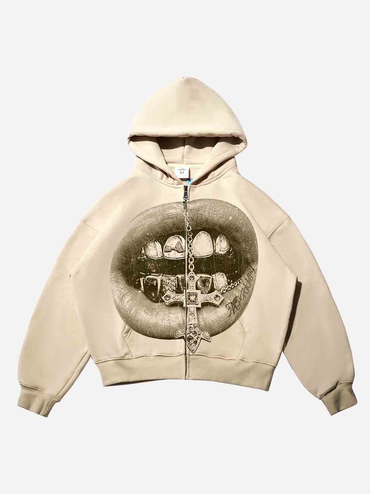 NOISSEY khaki zip-up hoodie featuring a retro sepia cross and grillz graphic