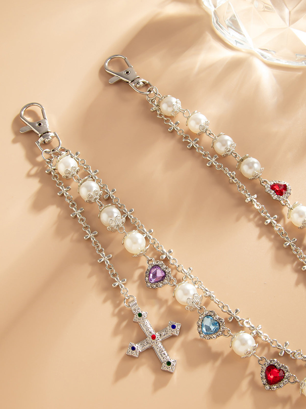 NOISSEY "SILVER BLOOM" MULTI-LAYERED PEARL & CRUCIFIX WAIST CHAIN