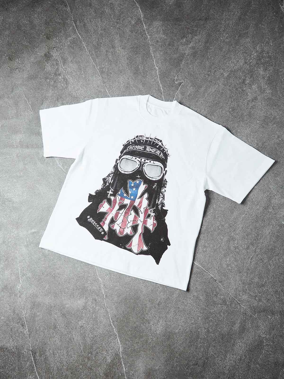 Studio layout of the 280GSM cotton tee highlighting the vibrant red, blue, and yellow cross accents against the deep black fabric.