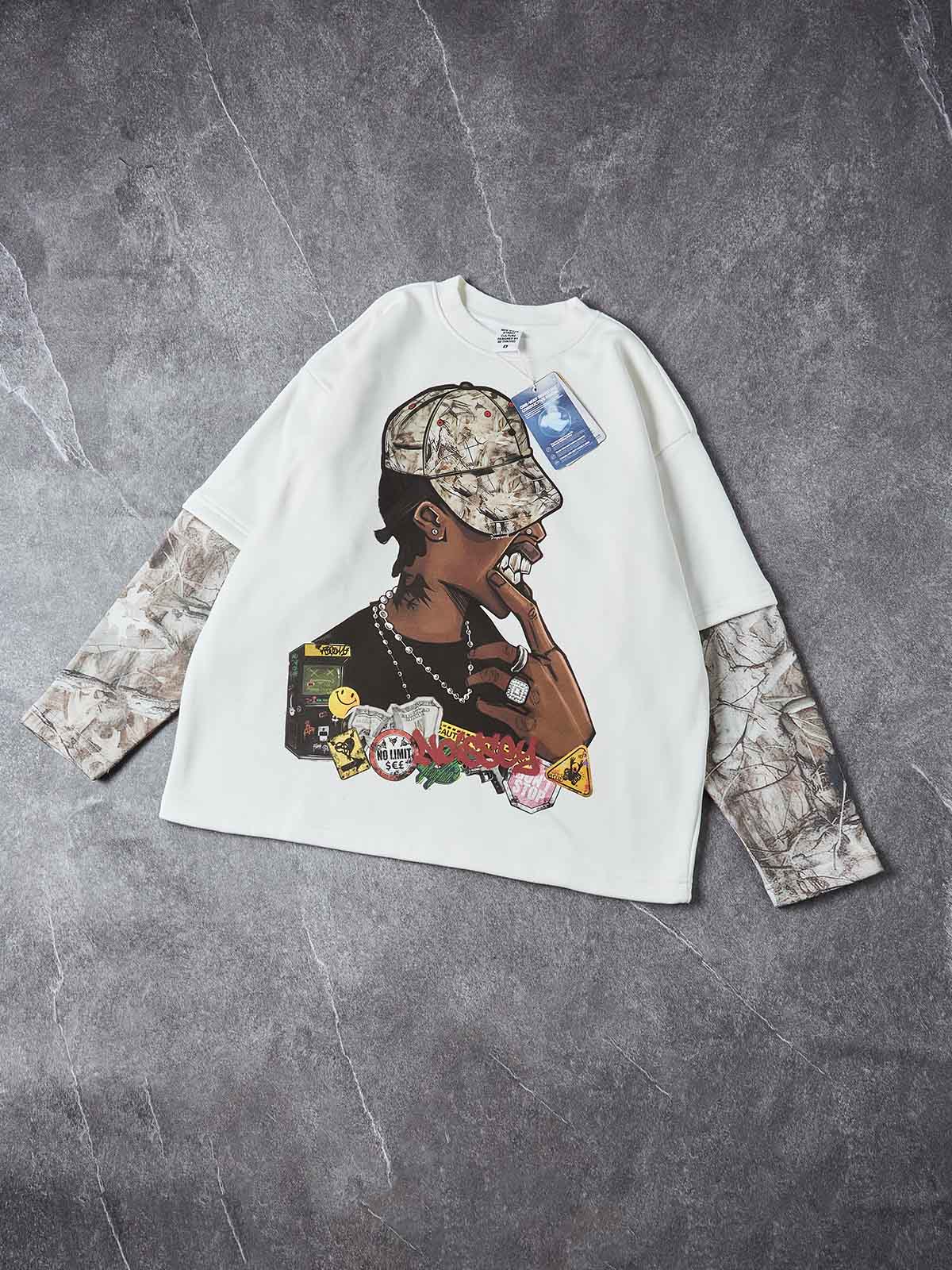 Studio layout of the NOISSEY long sleeve highlighting the contrasting "Real Tree" camouflage printed sleeves and the bold, multi-colored central graphic.